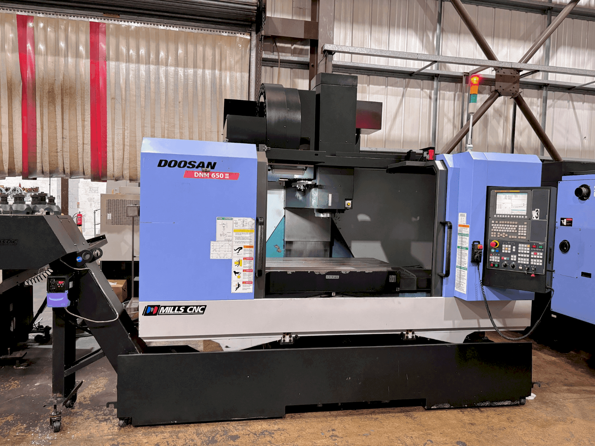 Mašīnas DOOSAN DNM 650 II pretskats