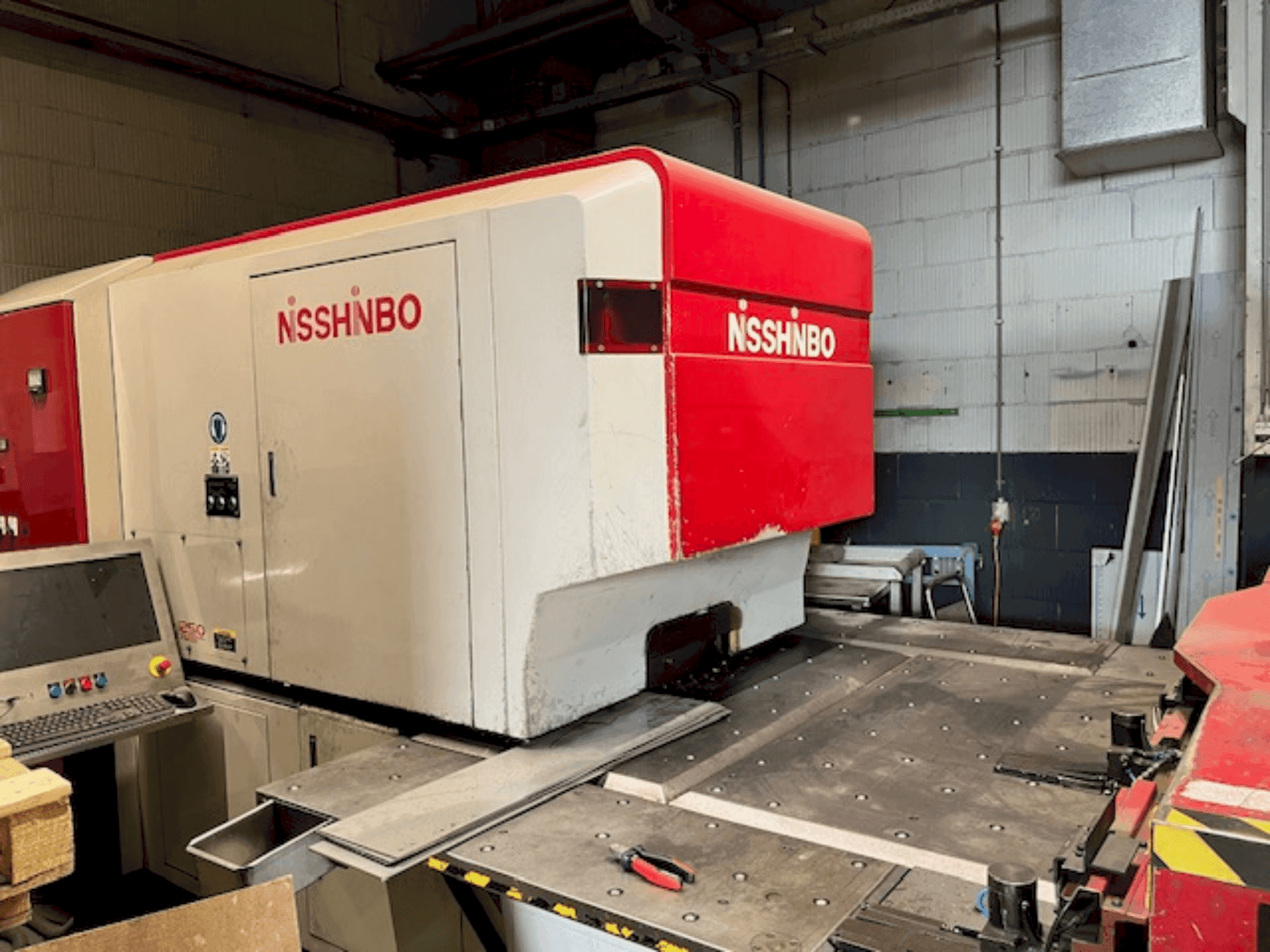 Mašīnas Nisshinbo HIQ-1250 pretskats