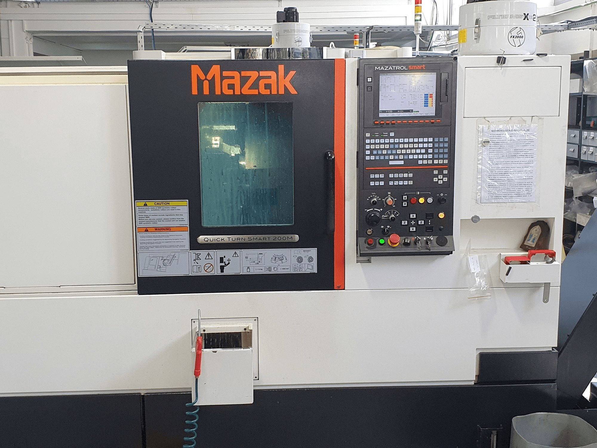 Mašīnas Mazak QTS200M pretskats
