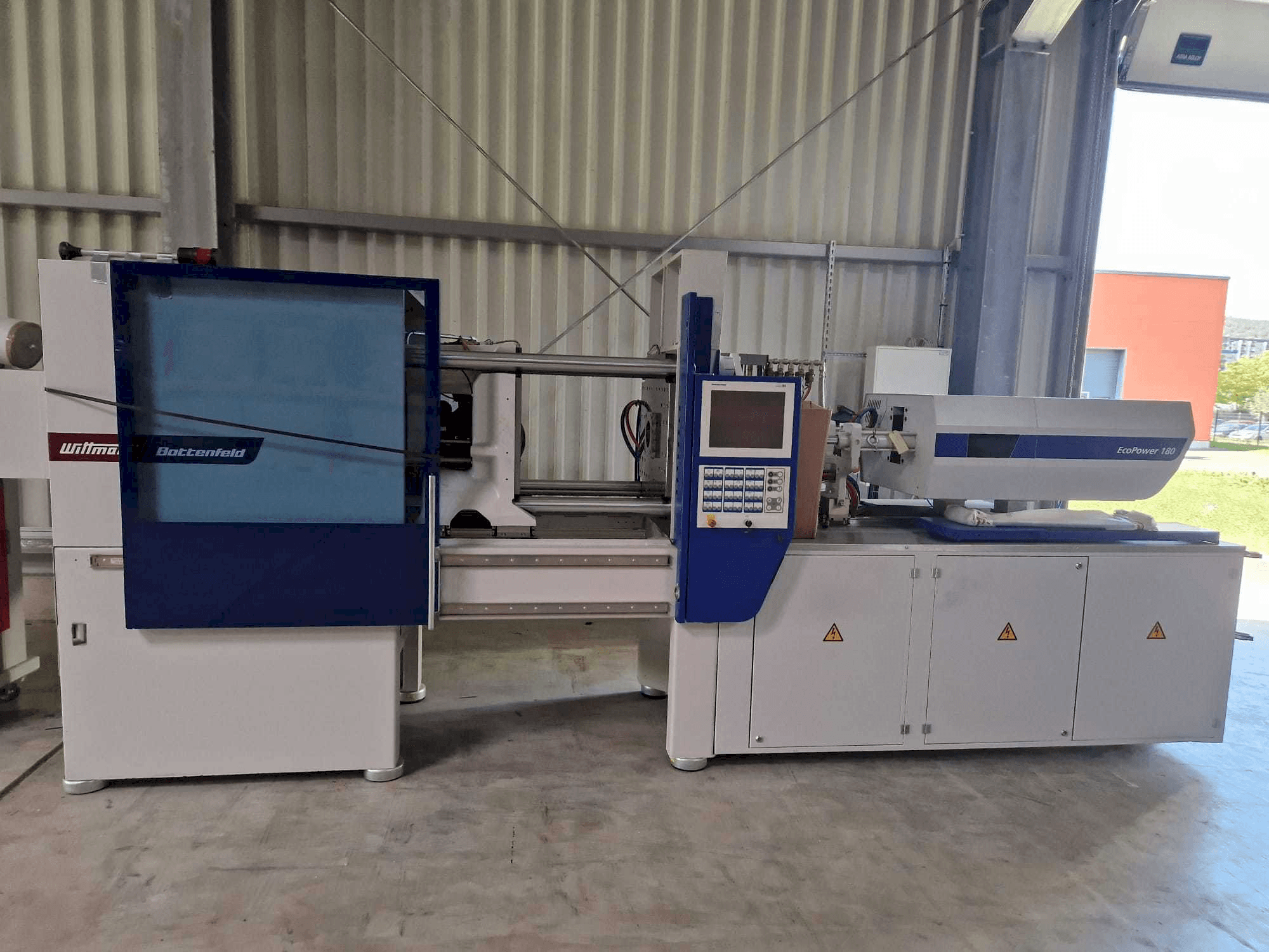 Mašīnas Battenfeld EcoPower180 pretskats