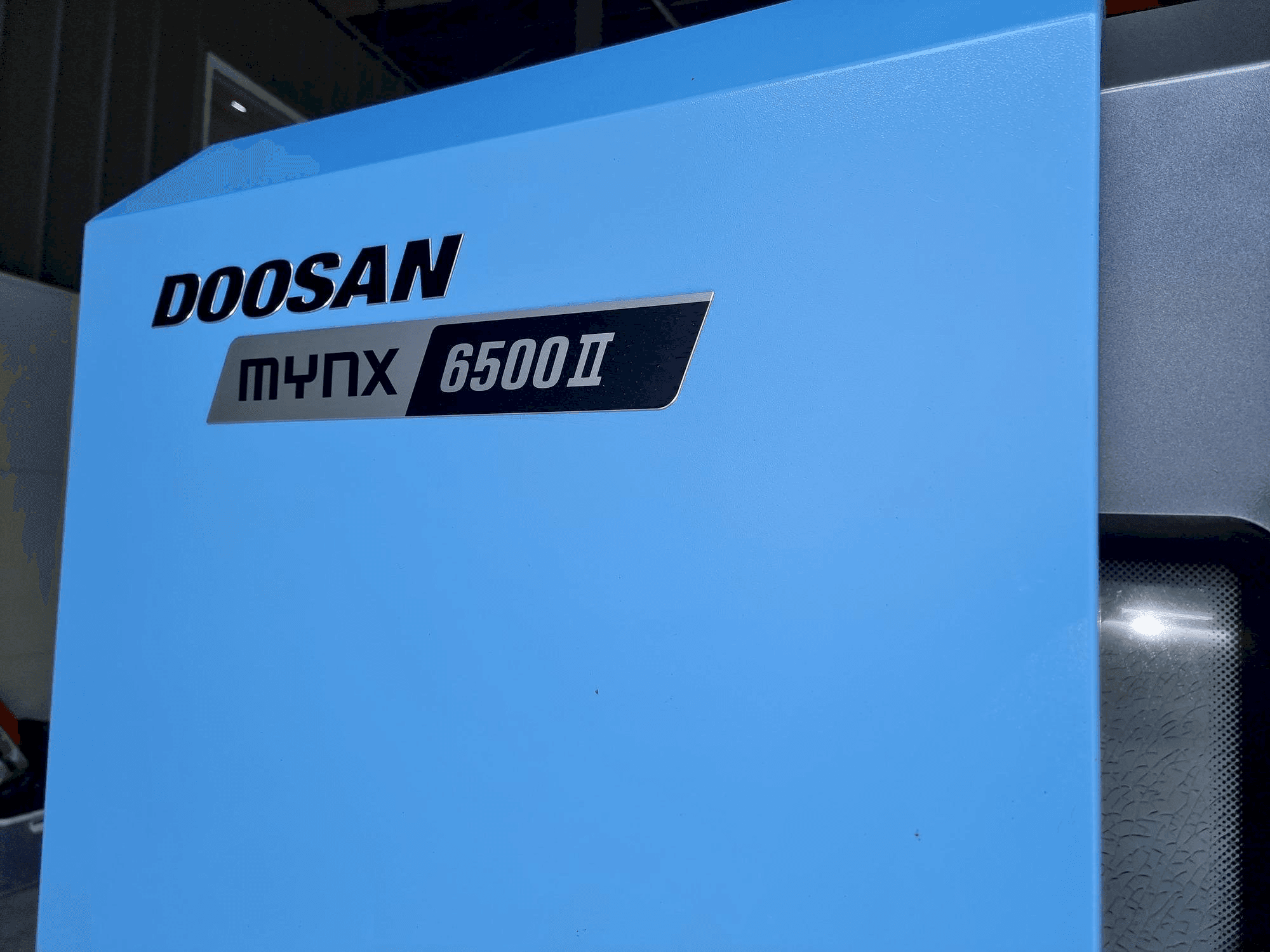 Mašīnas Doosan MYNX 6500Ⅱ pretskats