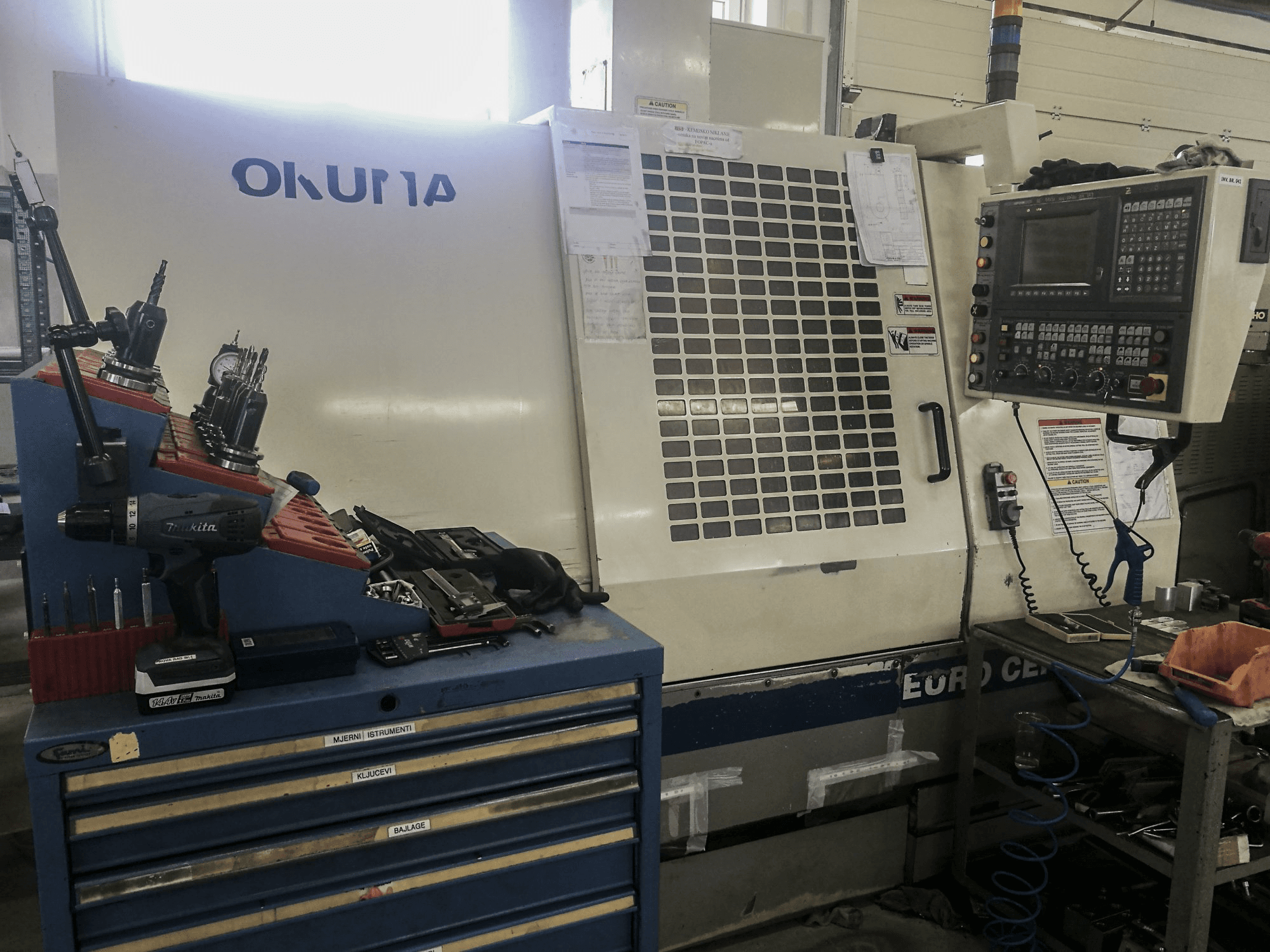 Mašīnas Okuma EURO CENTER V50 pretskats