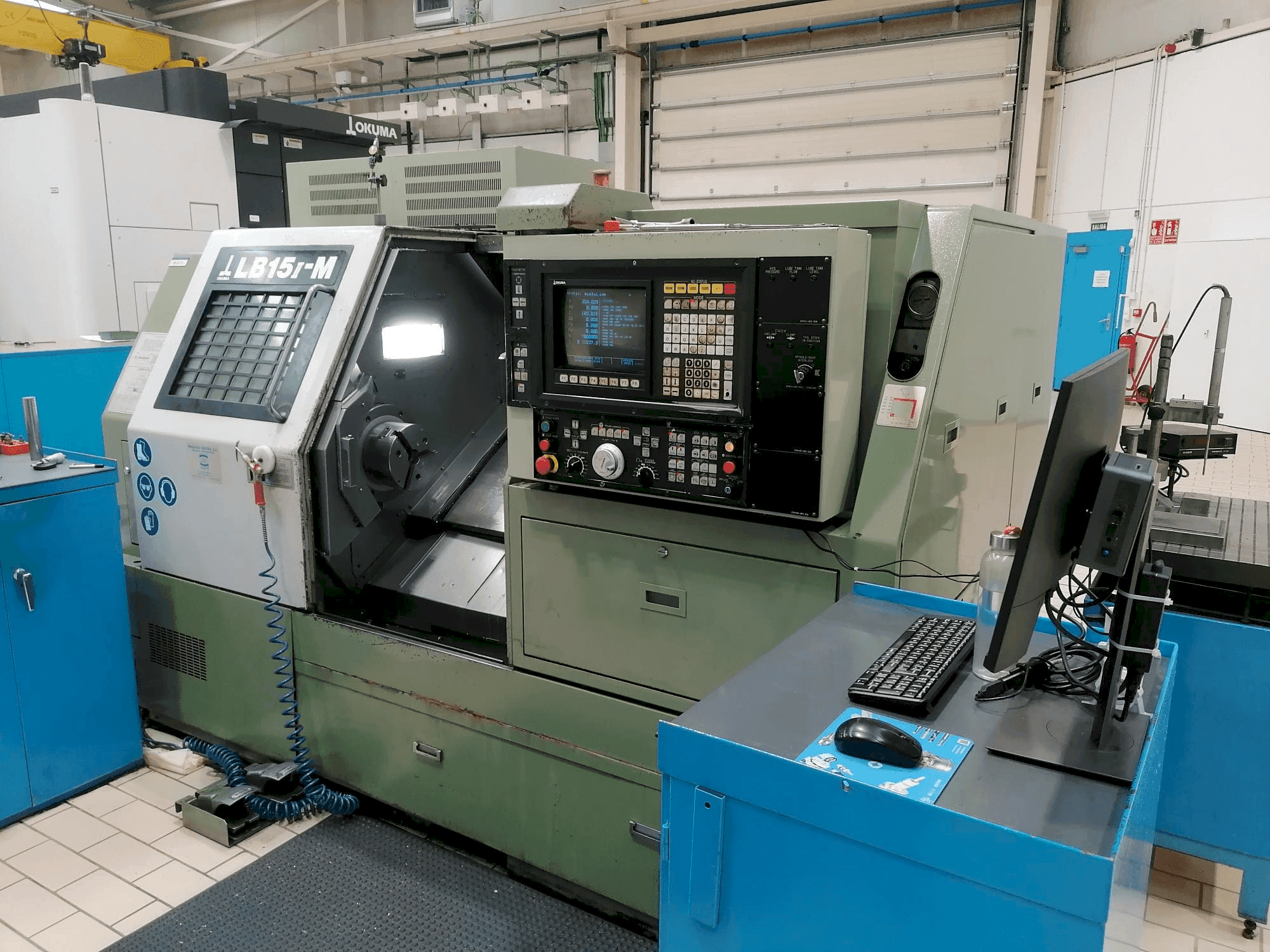 Mašīnas Okuma LB15-M pretskats