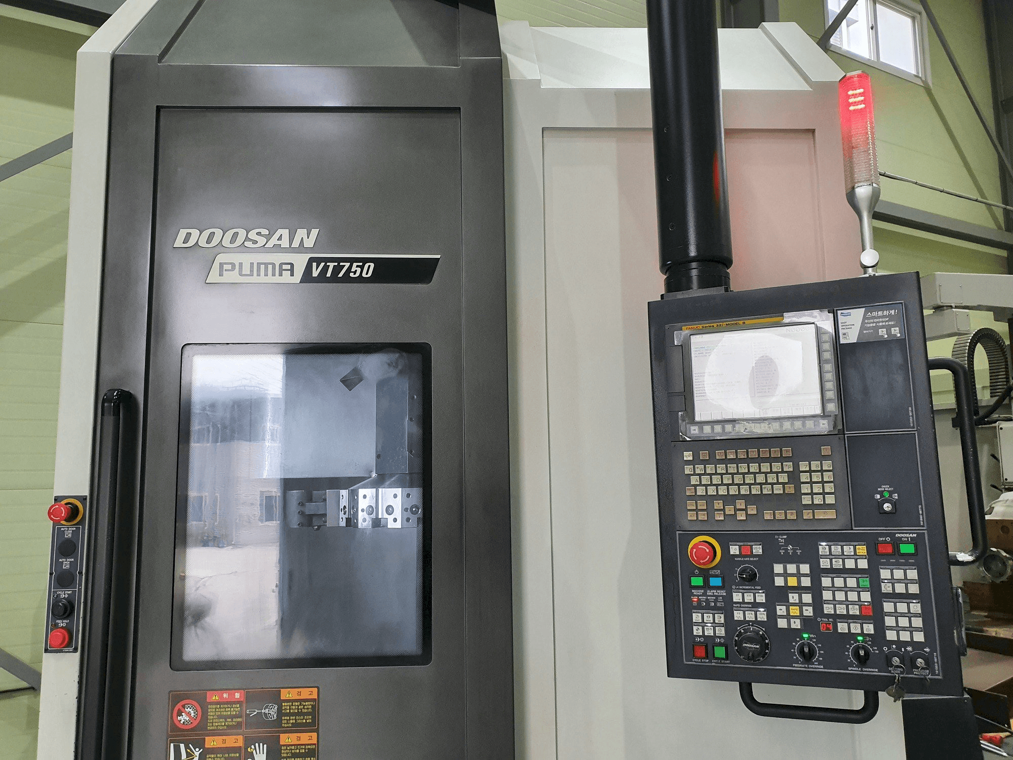 Mašīnas Doosan VT750 pretskats