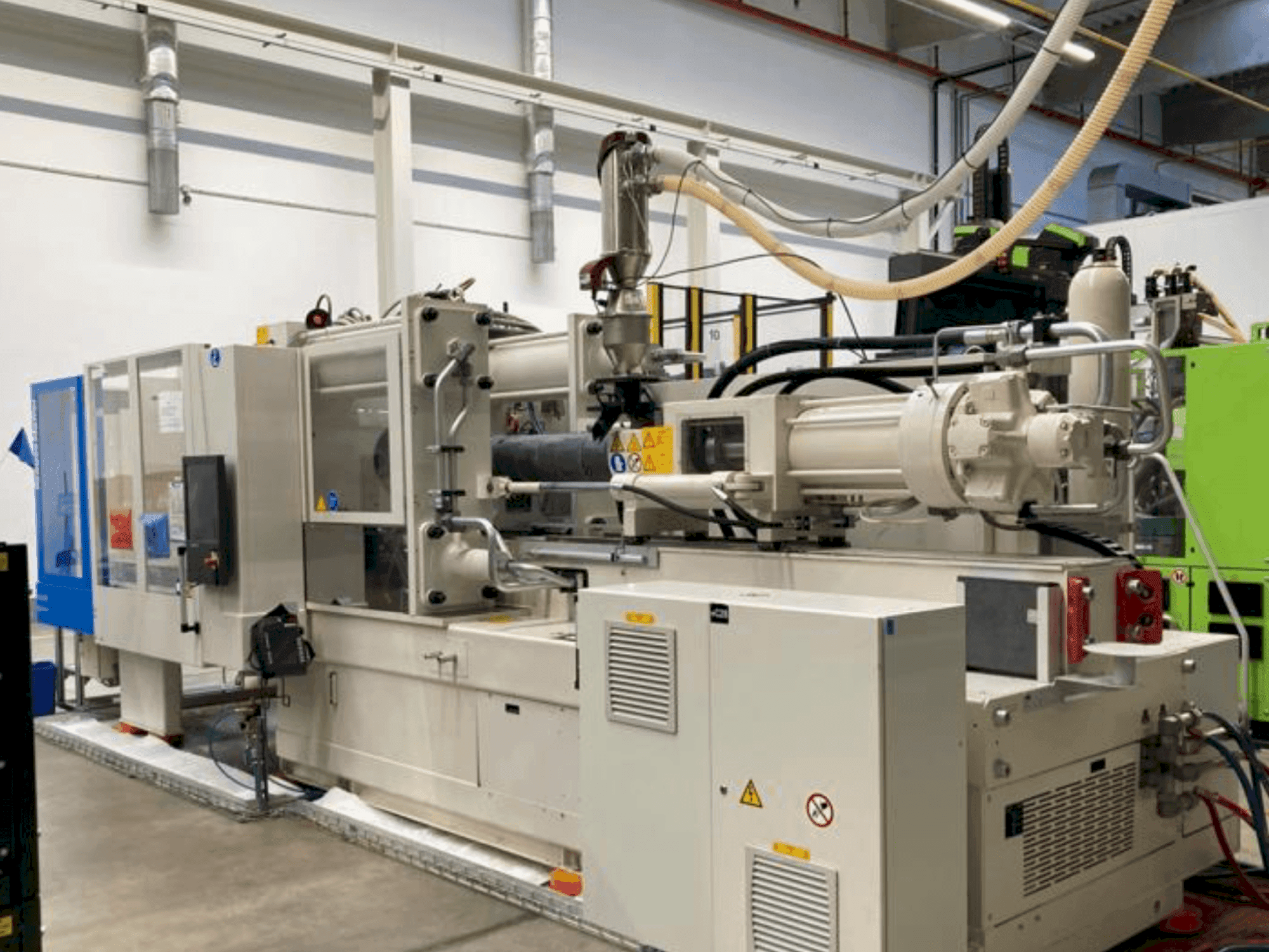 Mašīnas Krauss Maffei 420-2000 CX pretskats