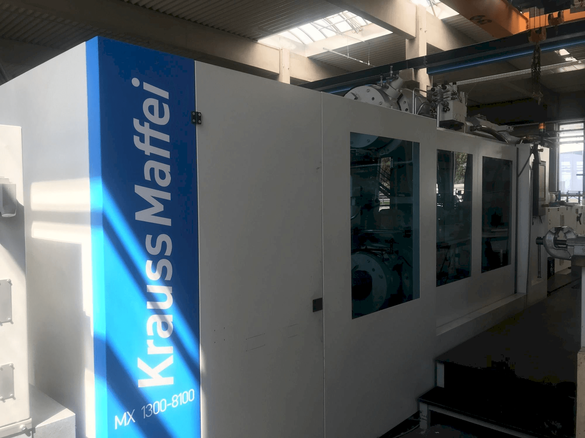 Mašīnas Krauss Maffei 1300-8100 MX pretskats