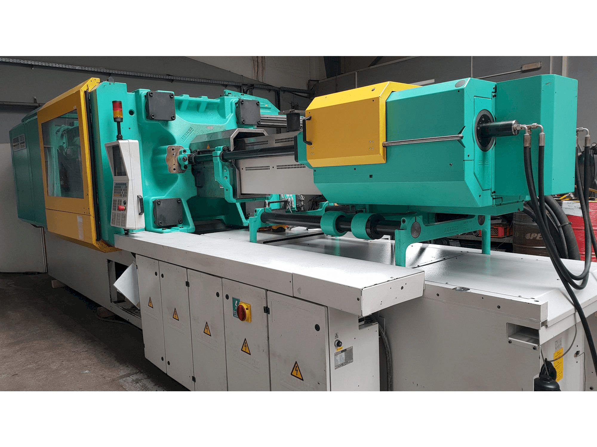 Mašīnas Arburg Multilift H 720 - 3200 - 1300 pretskats