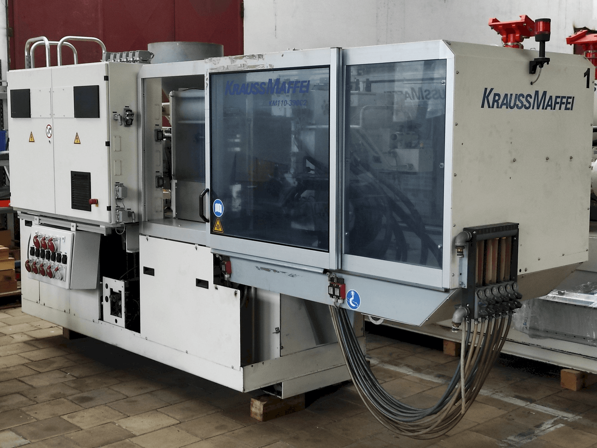 Mašīnas Krauss Maffei 110 - 390 C2 pretskats