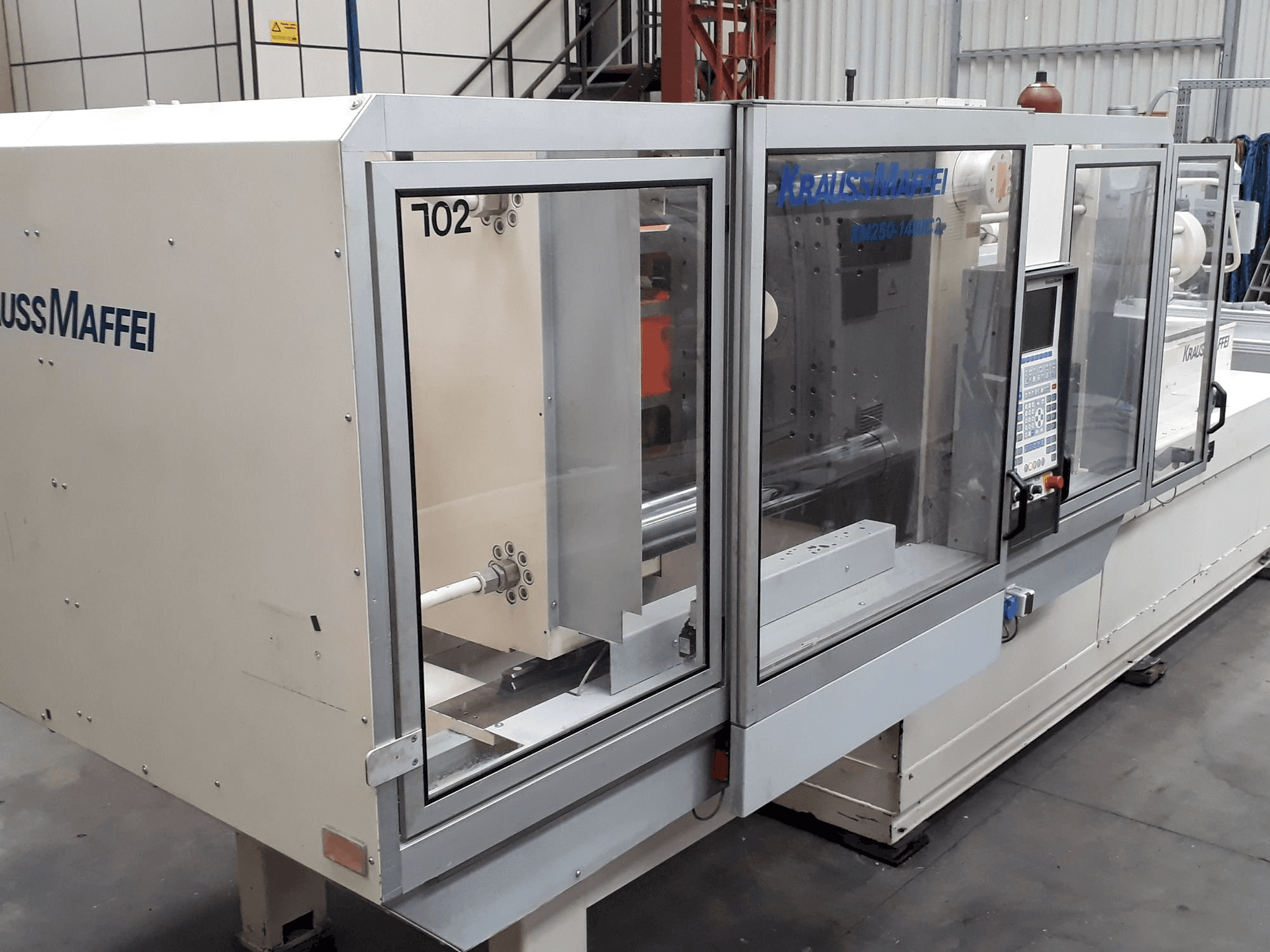 Mašīnas Krauss Maffei 250-1400 C2 pretskats