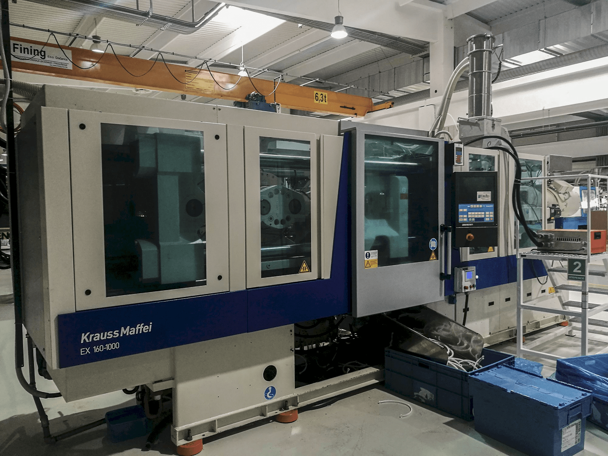 Mašīnas Krauss Maffei 160-1000 EX skats no kreisās puses