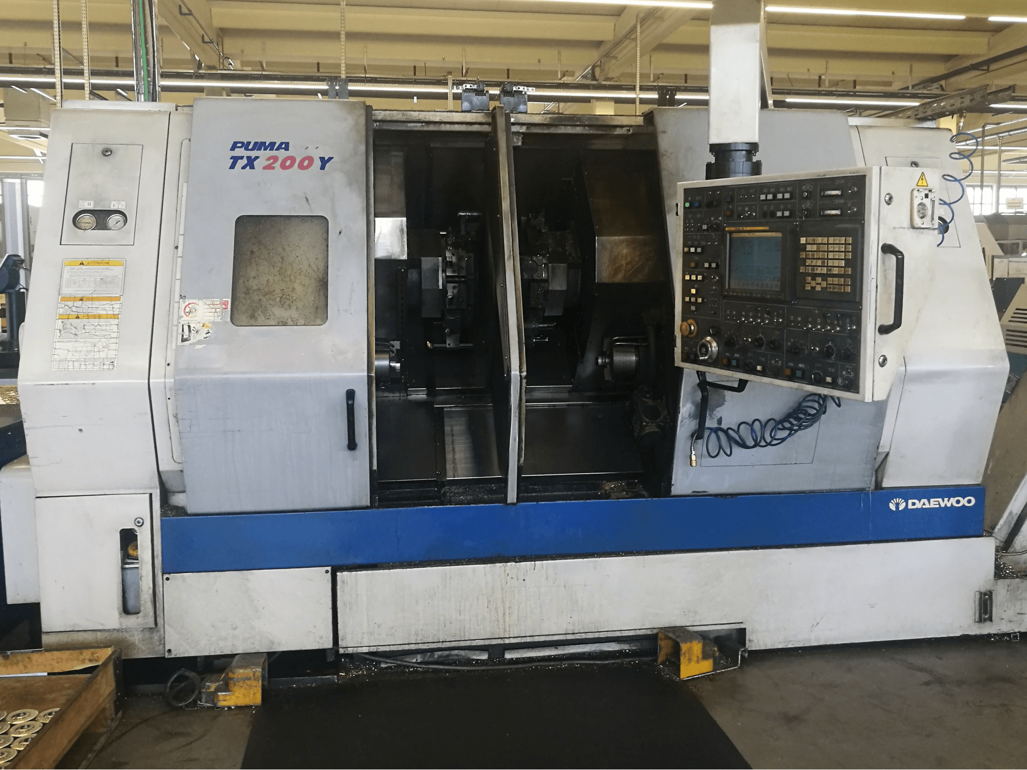 Mašīnas DAEWOO PUMA TX200Y pretskats