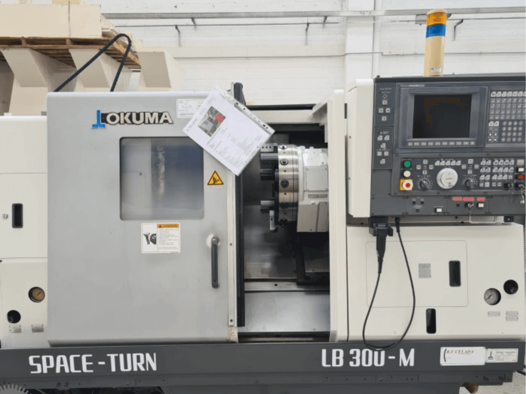 Mašīnas Okuma LB 300 pretskats