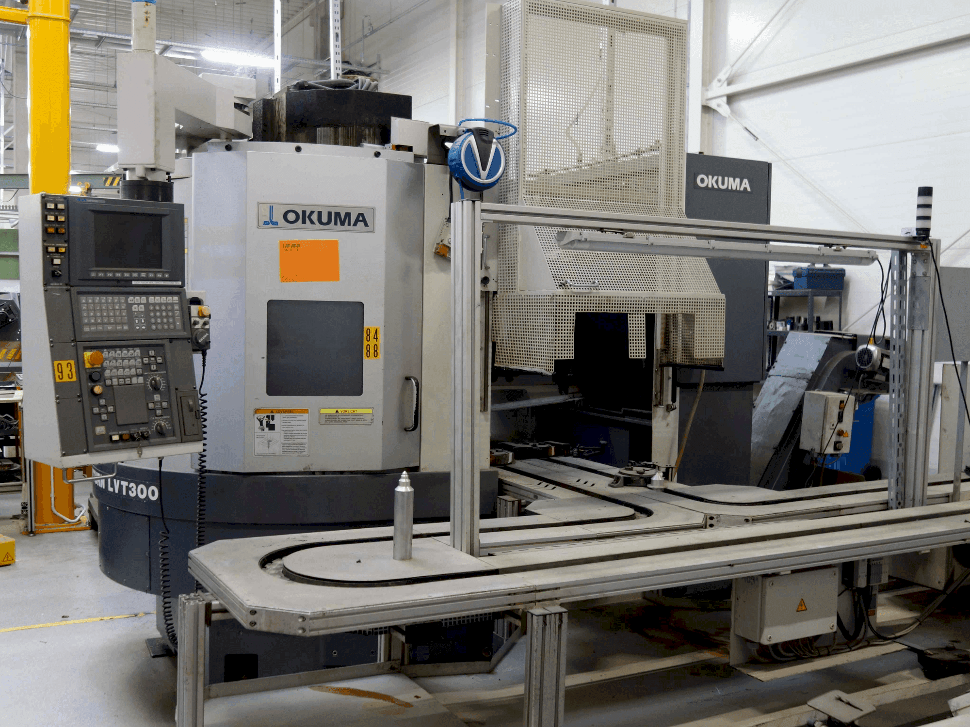 Mašīnas Okuma LVT 300 pretskats