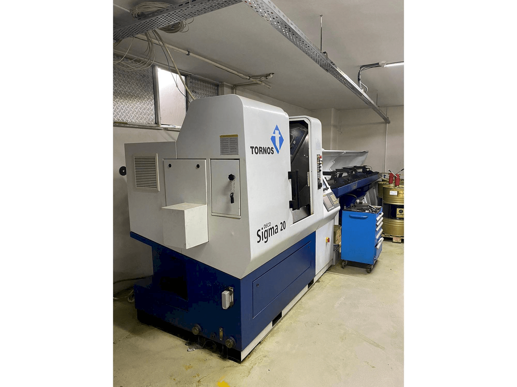 Mašīnas Tornos Delta Sigma 20 kreisās malas skats