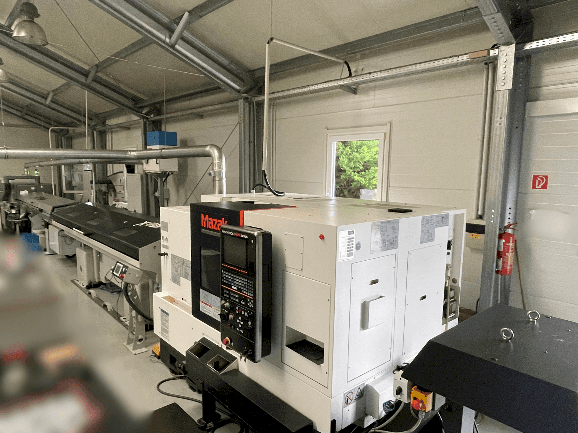 Mašīnas Mazak Quick Turn Nexus 200-II MS pretskats