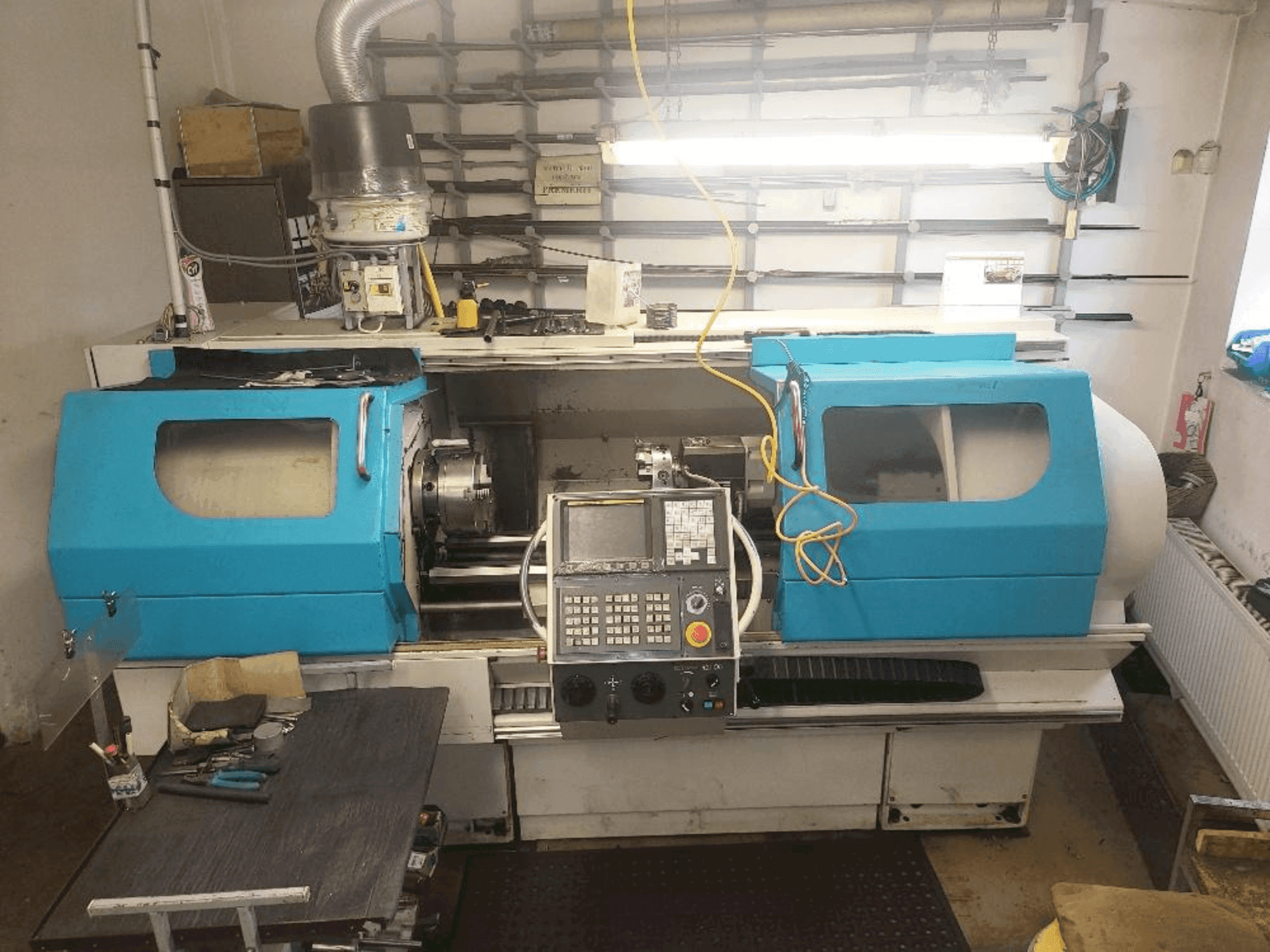 Mašīnas 600 Lathes Multiturn 2000 pretskats