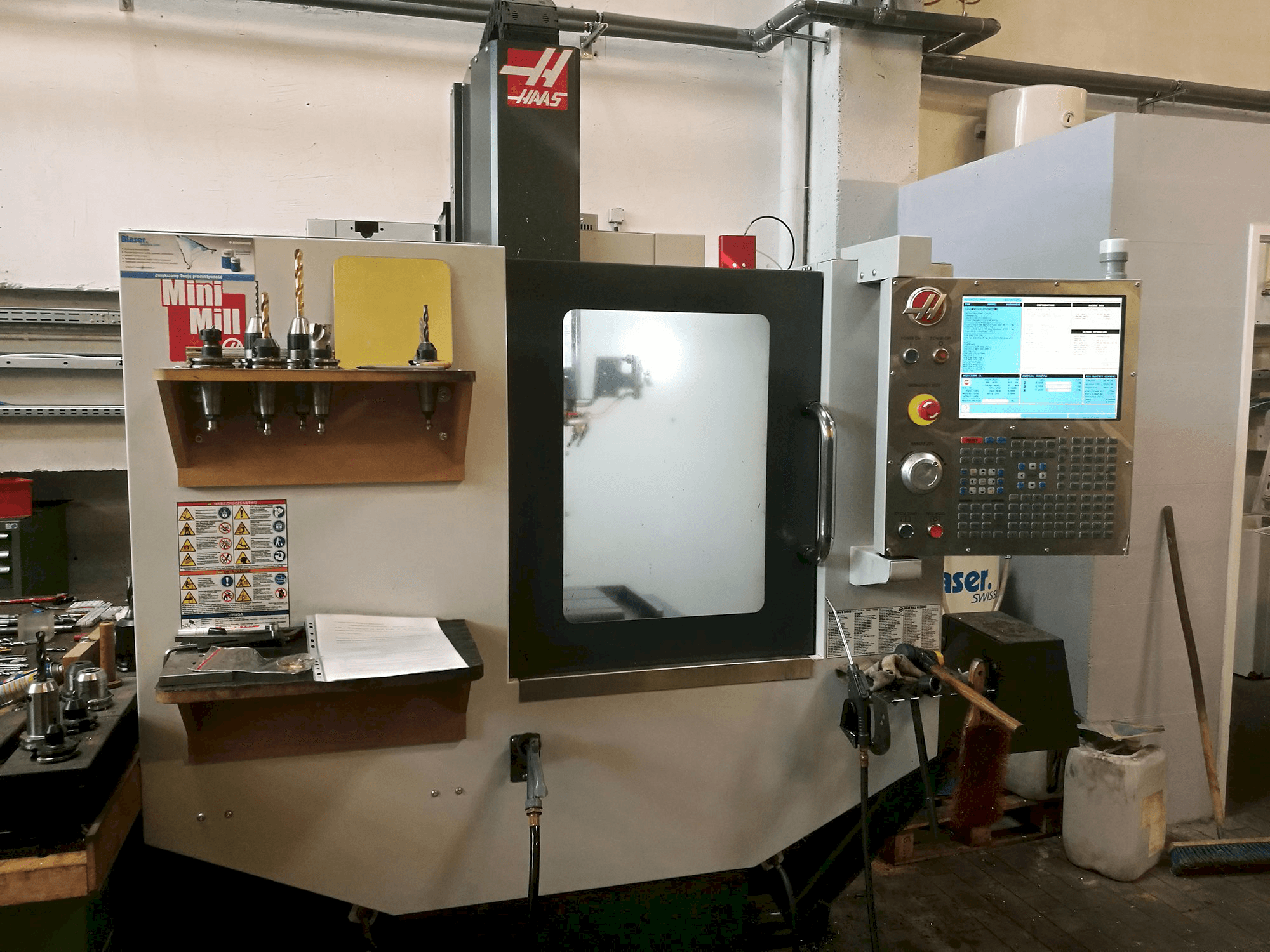 Mašīnas HAAS MINIMILL pretskats
