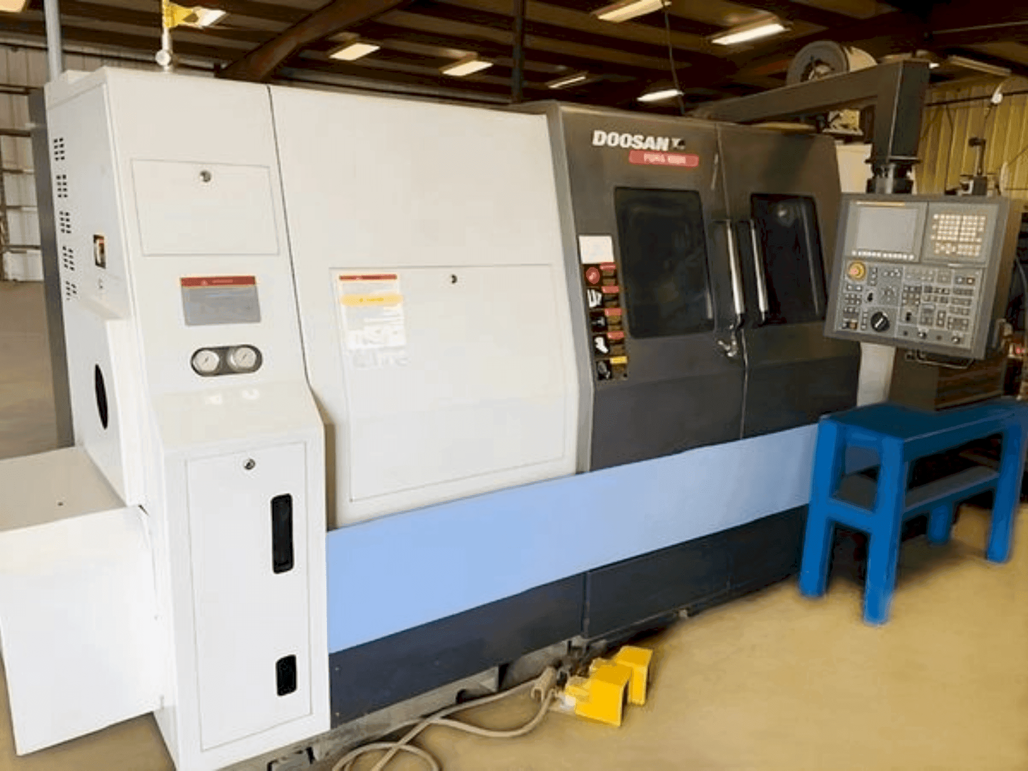 Mašīnas DOOSAN PUMA 400MB pretskats