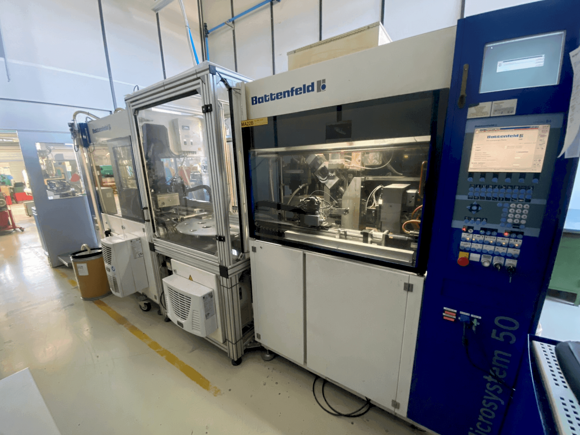 Mašīnas Battenfeld Microsystem MM 50/50 pretskats