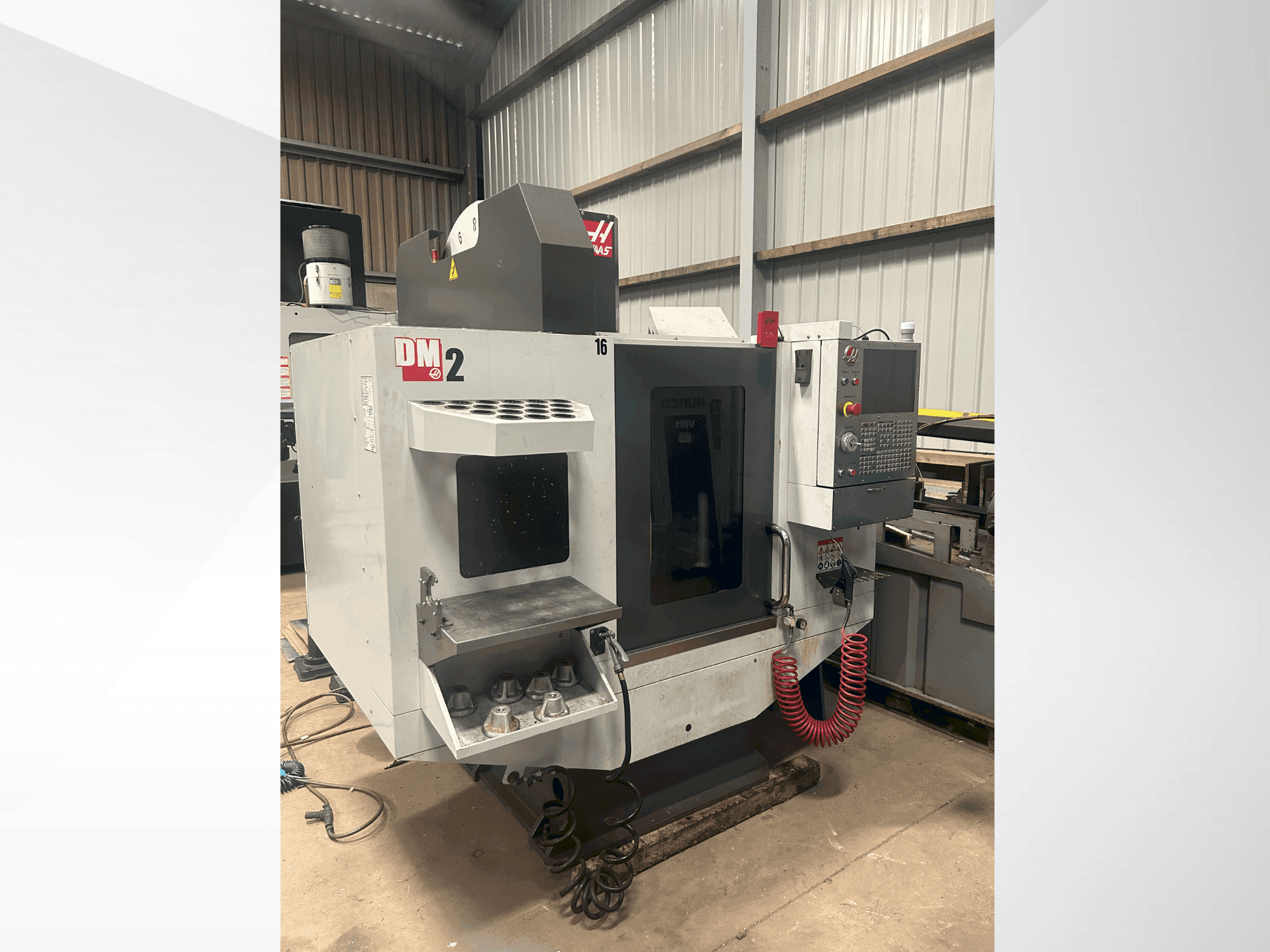 Mašīnas HAAS DM-2 pretskats