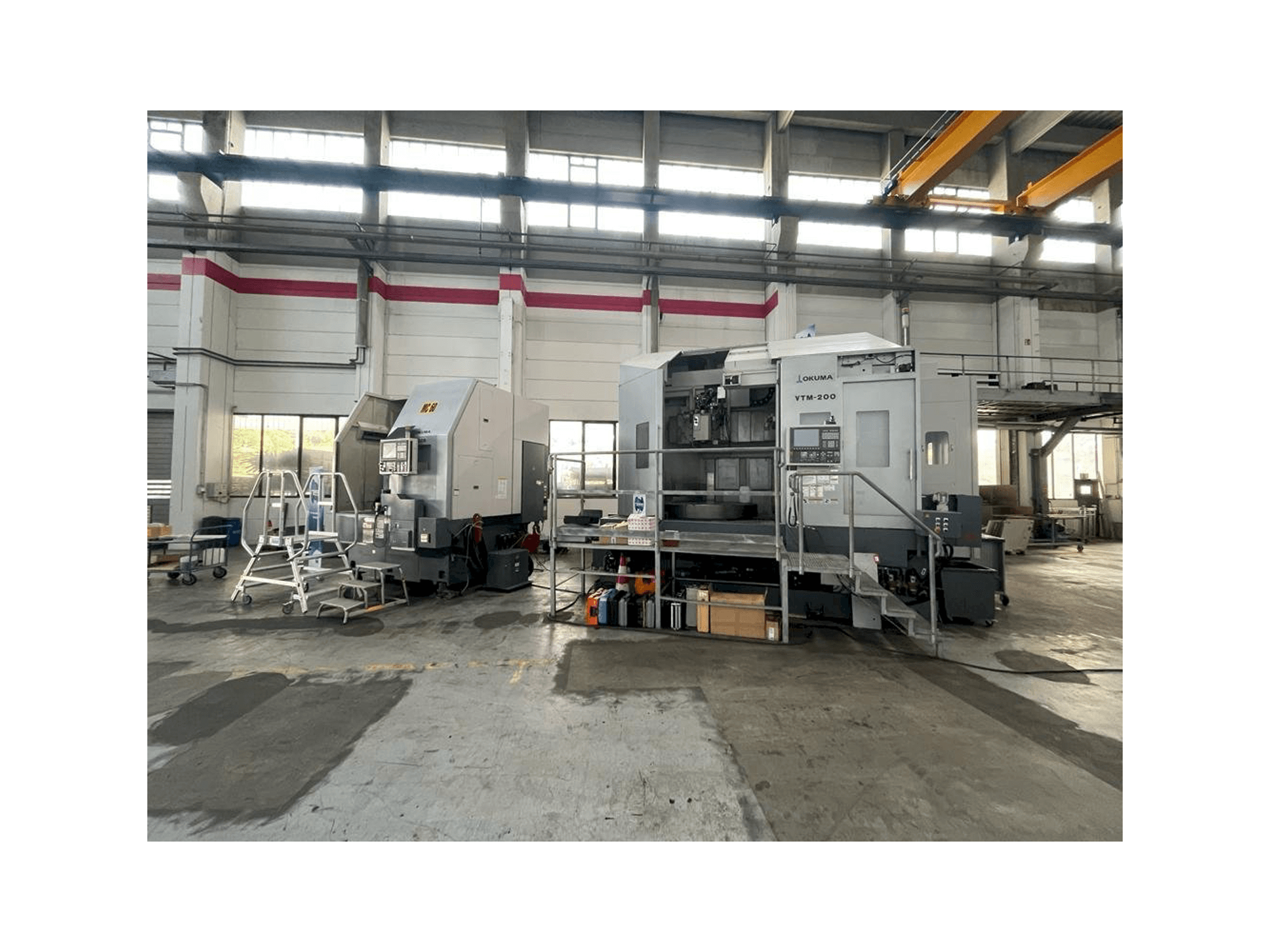 Mašīnas Okuma VTM-200 1ST pretskats