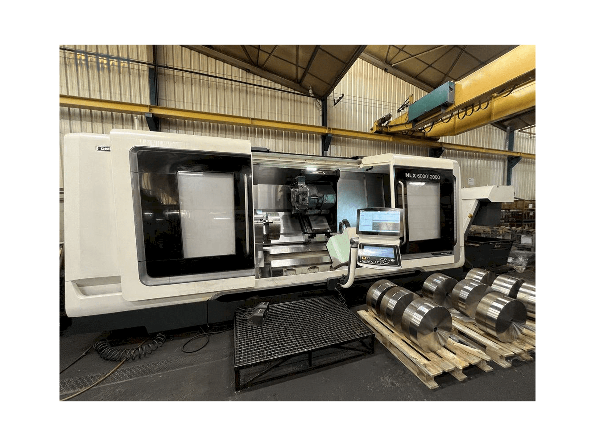 Mašīnas DMG MORI NLX 6000 | 2000 kreisās malas skats