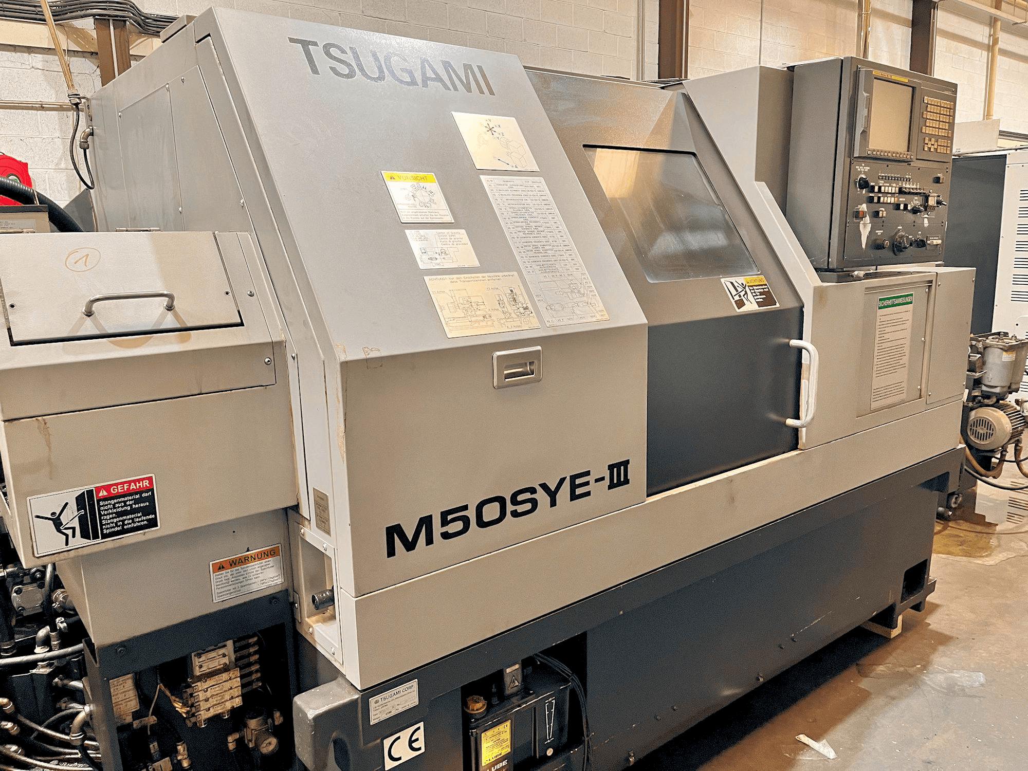 Mašīnas TSUGAMI M50SYE-III pretskats