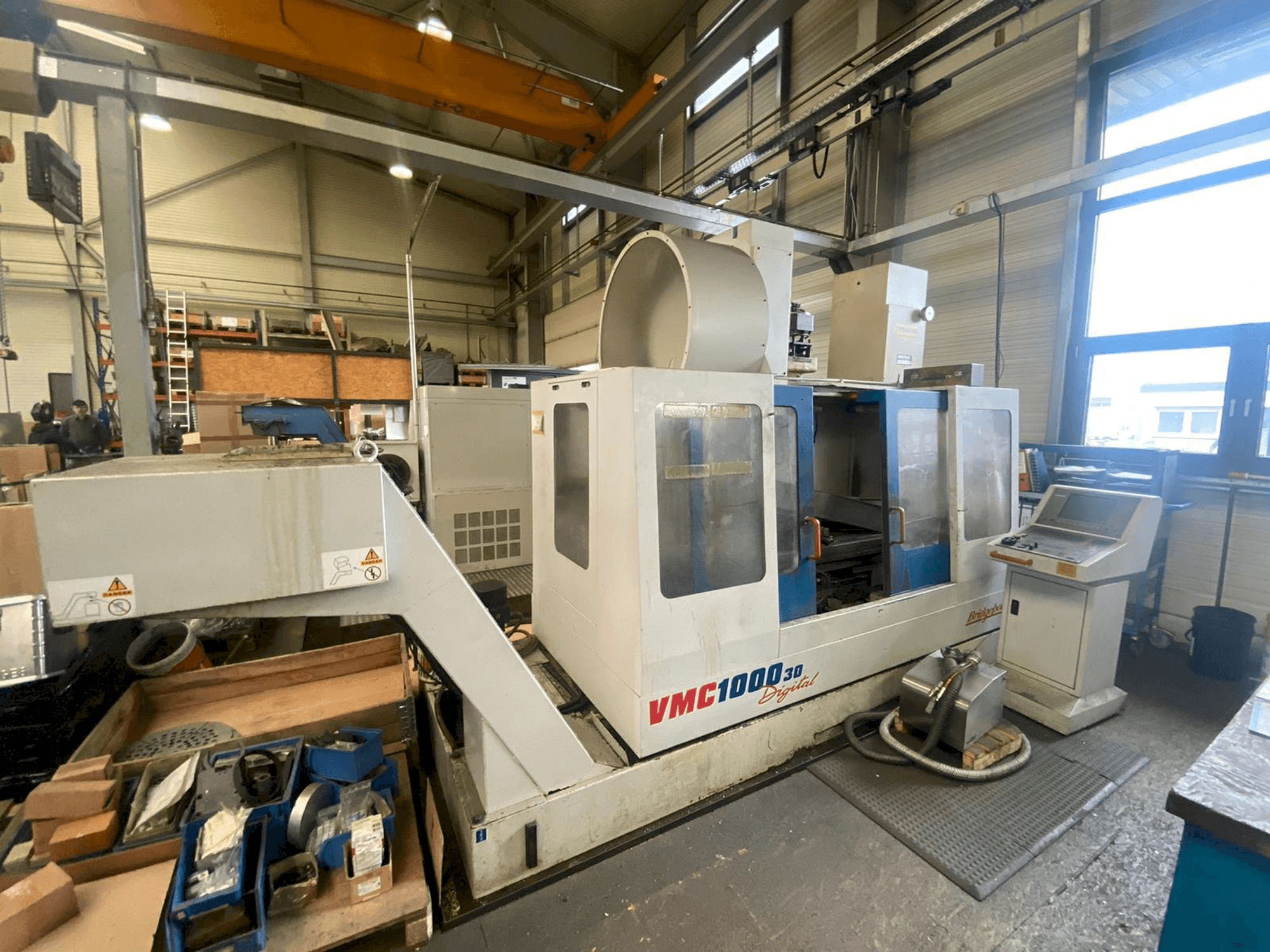 Mašīnas Bridgeport VMC 1000/30 pretskats