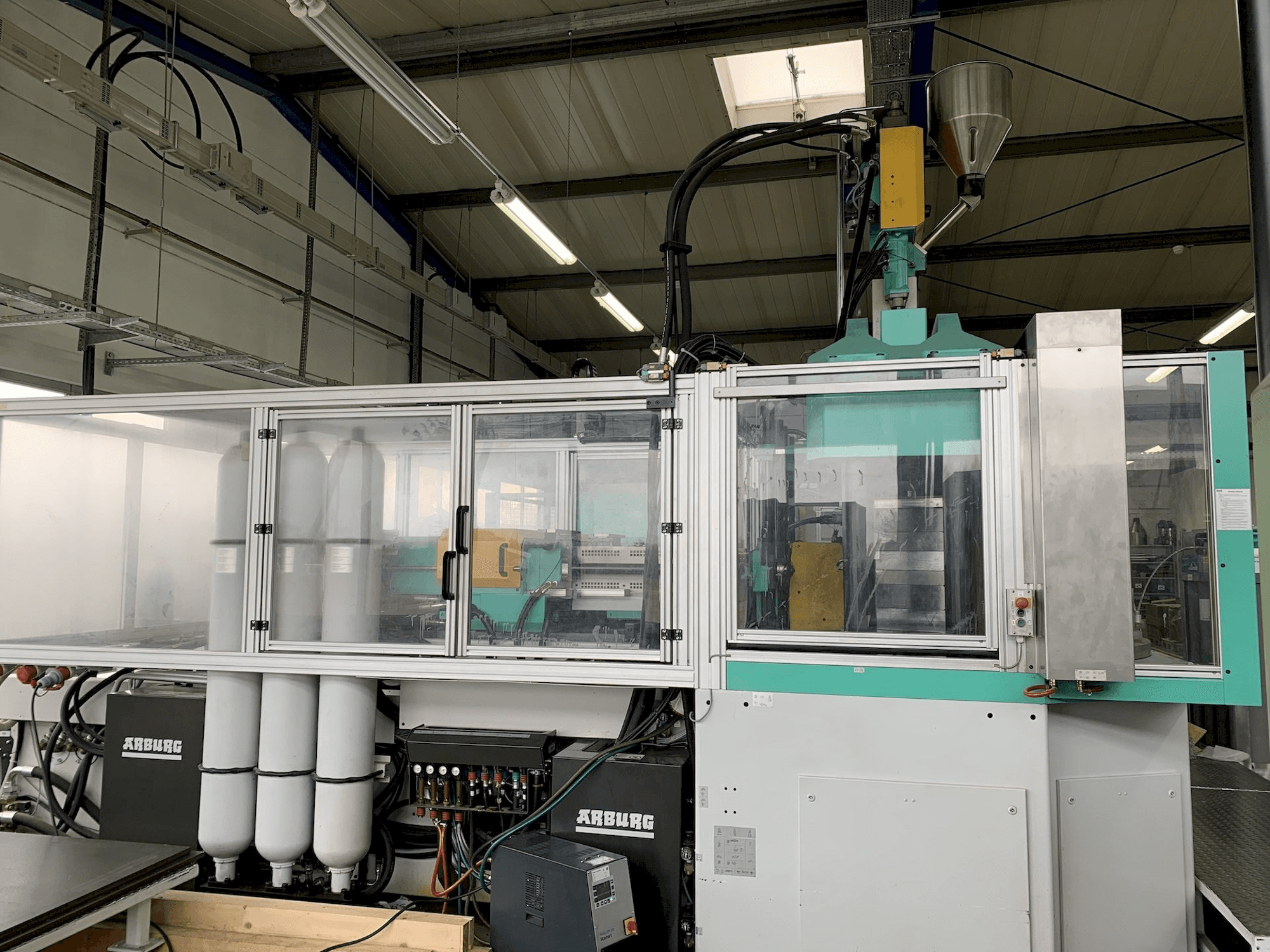 Mašīnas Arburg Allrounder 1500 T 2500-400 pretskats