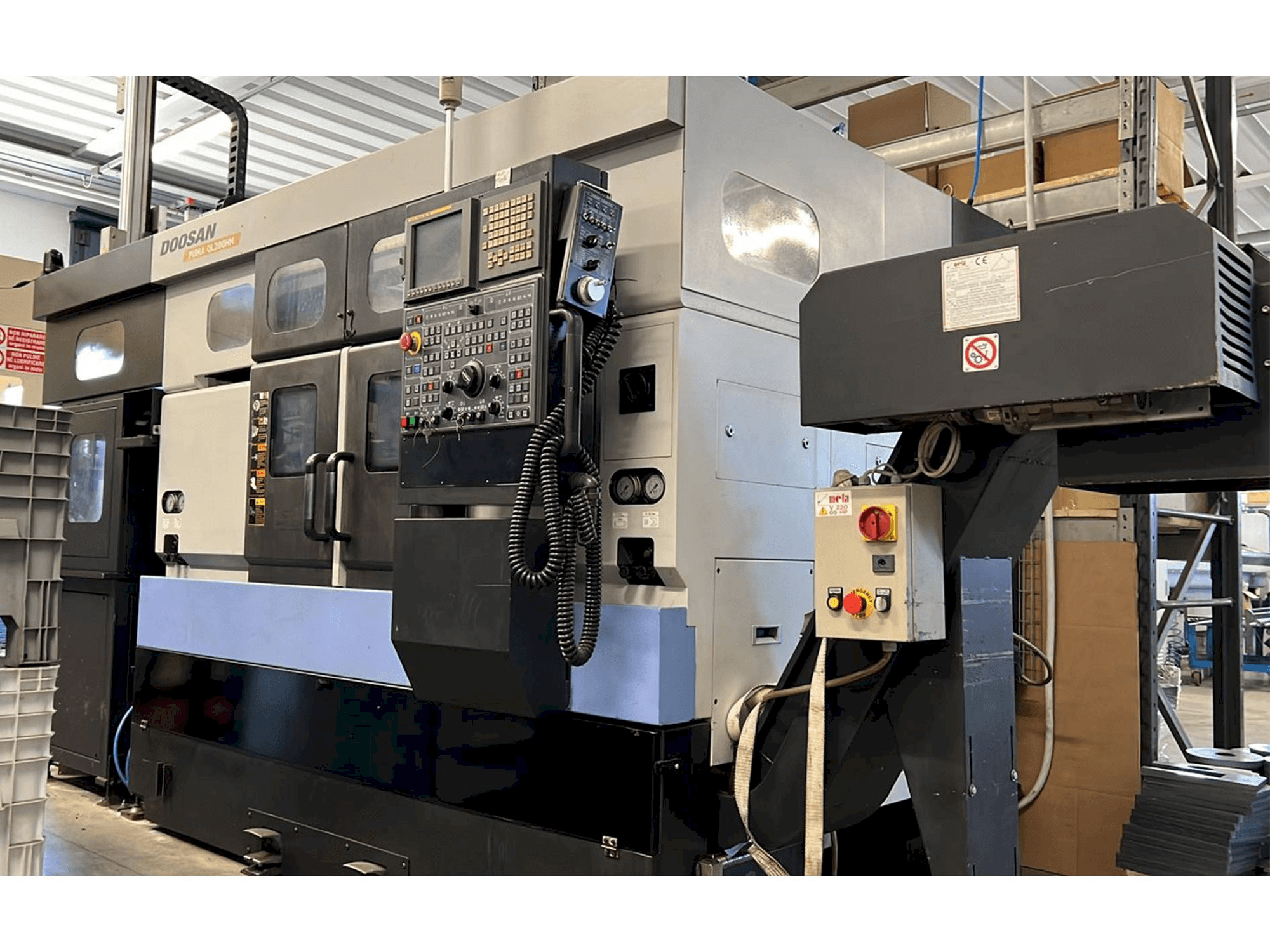 Mašīnas Doosan Puma QL 200HM pretskats