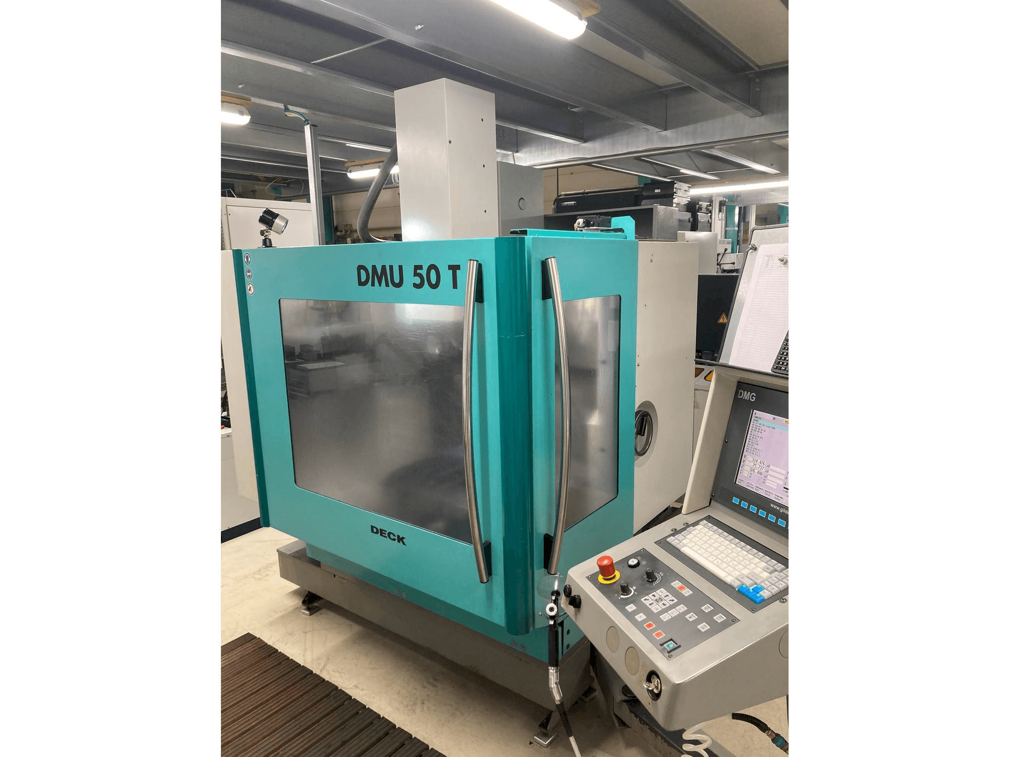 Mašīnas DMG DMU 50 T pretskats