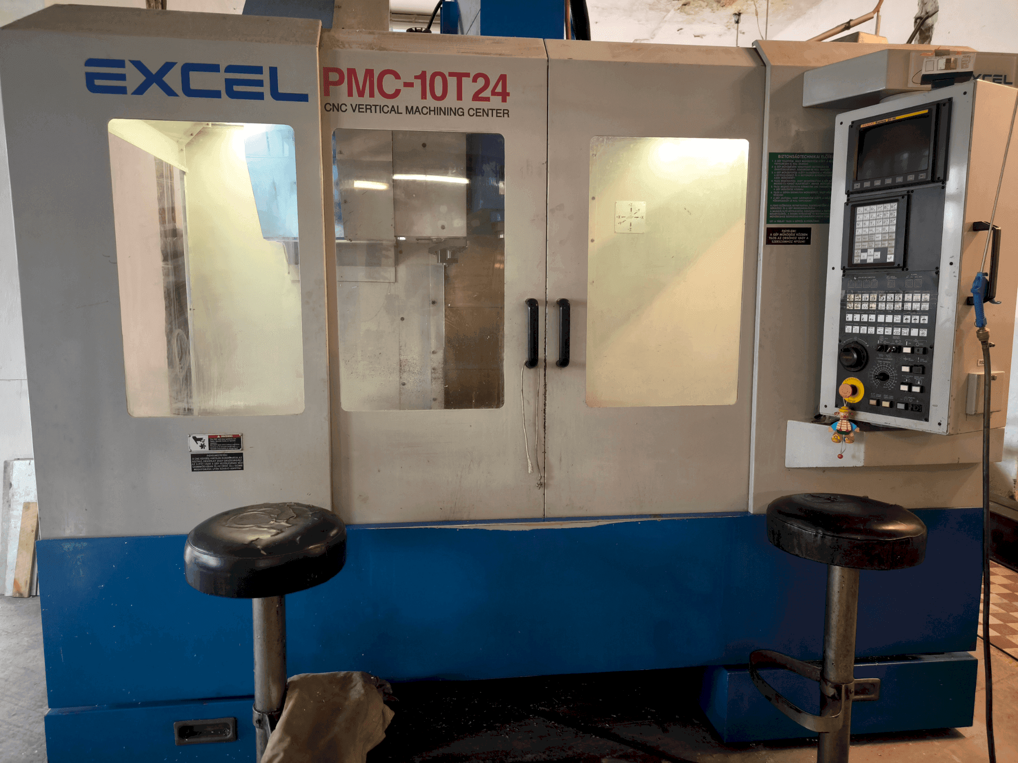 Mašīnas Excel Excel PMC 10T24 (2004) pretskats