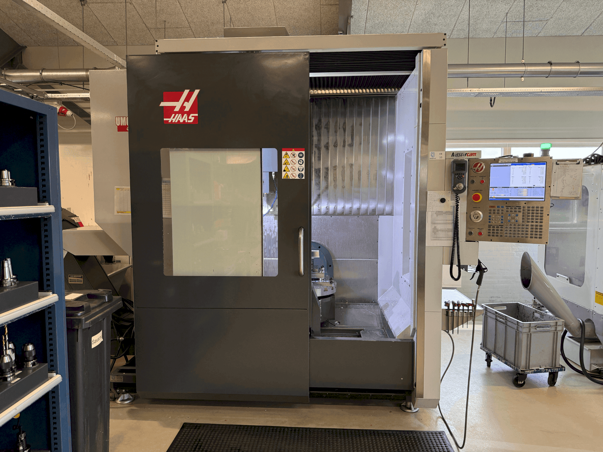 Mašīnas HAAS UMC-750 pretskats