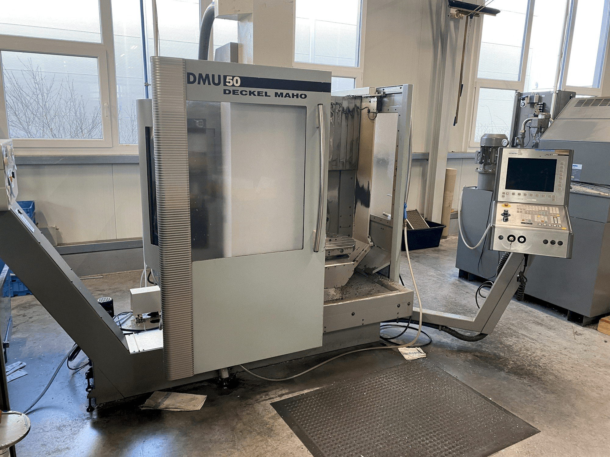 Mašīnas DECKEL MAHO DMU 50 pretskats