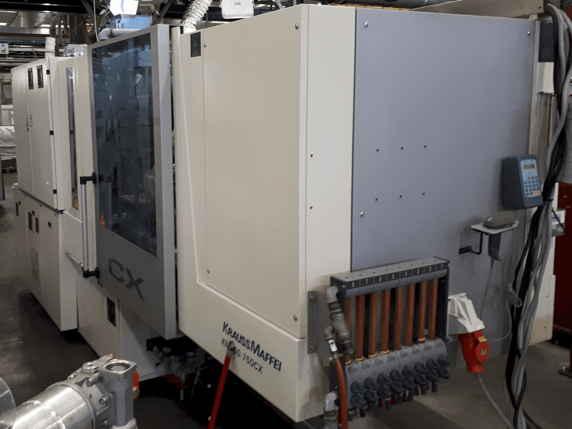 Mašīnas Krauss Maffei 160-750 CX pretskats