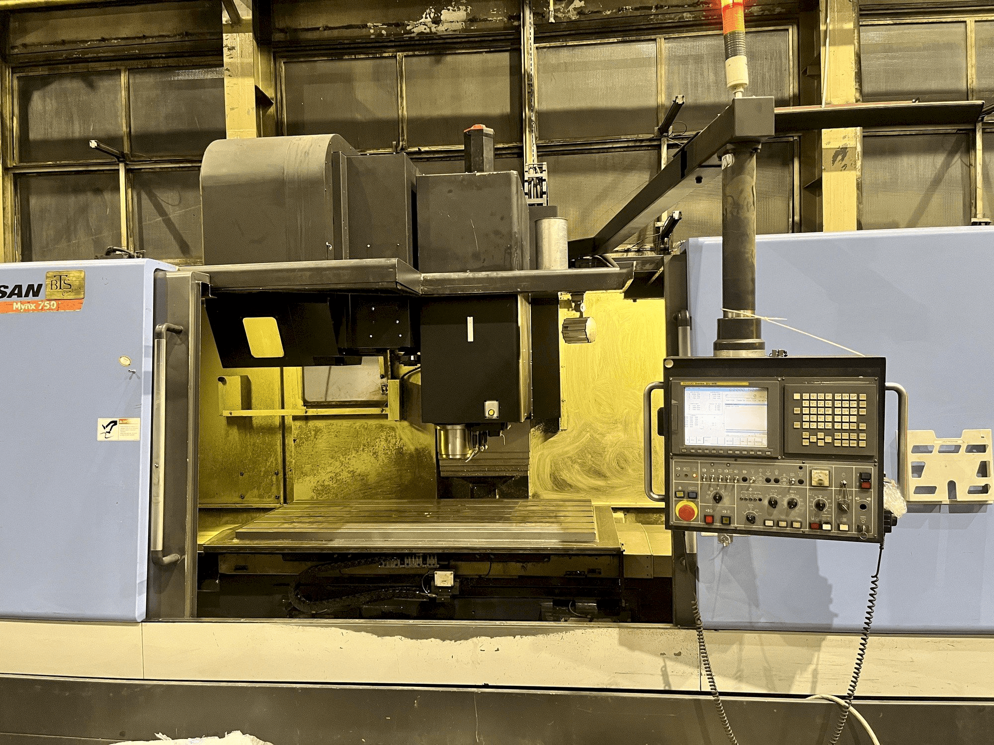 Mašīnas Doosan MYNX 750 pretskats