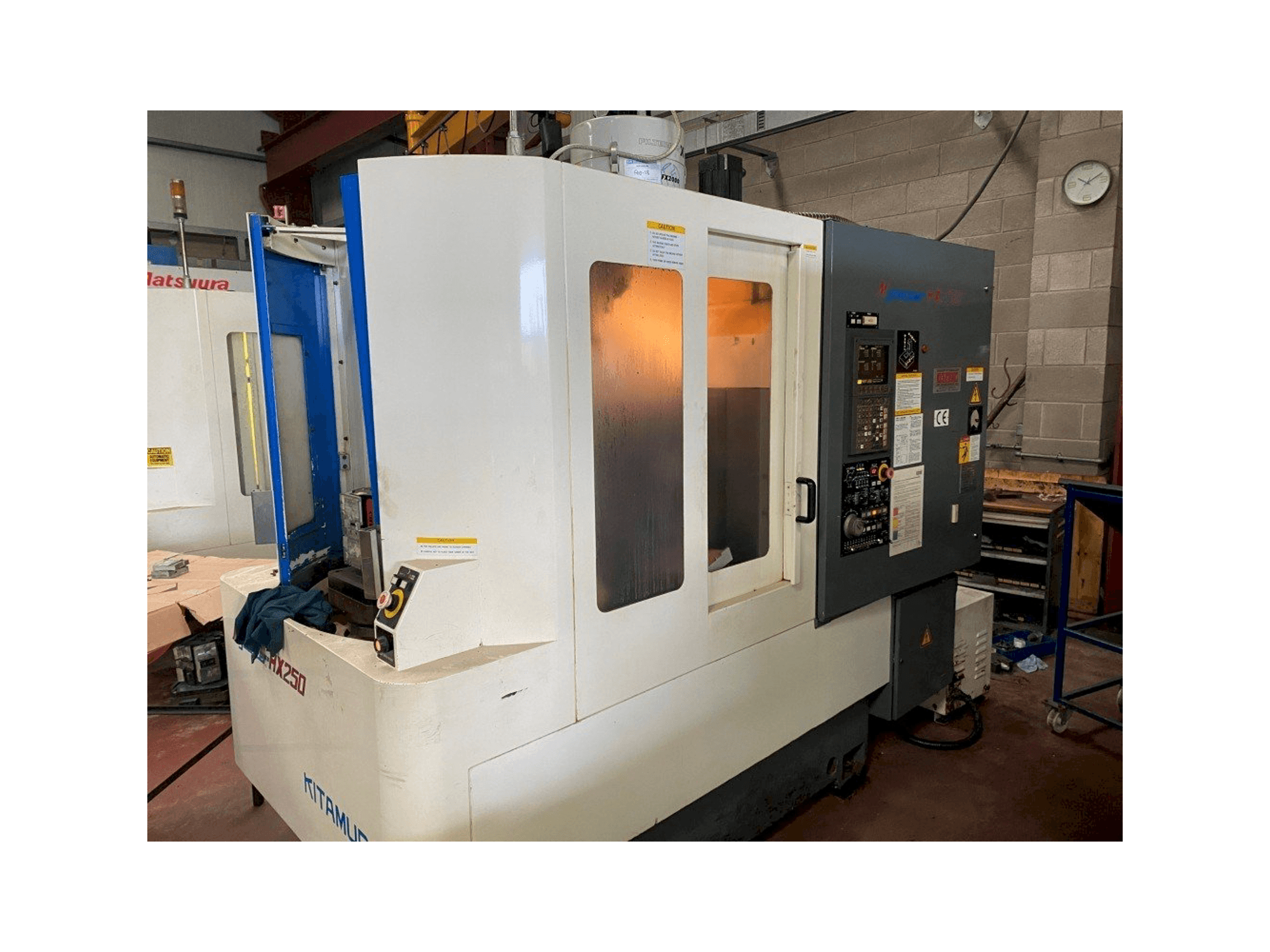 Mašīnas Kitamura Mycenter HX250 pretskats