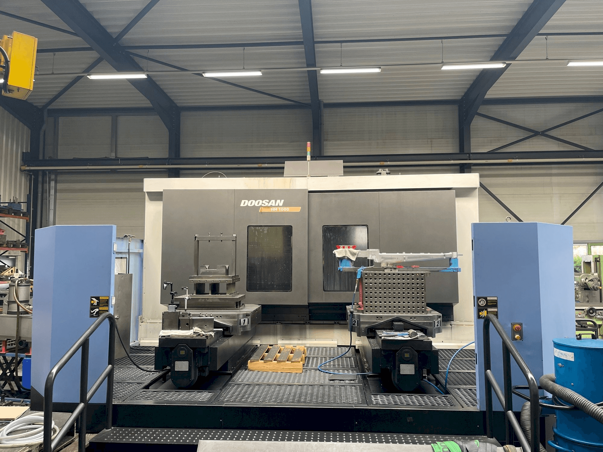 Mašīnas Doosan HM 1000 pretskats