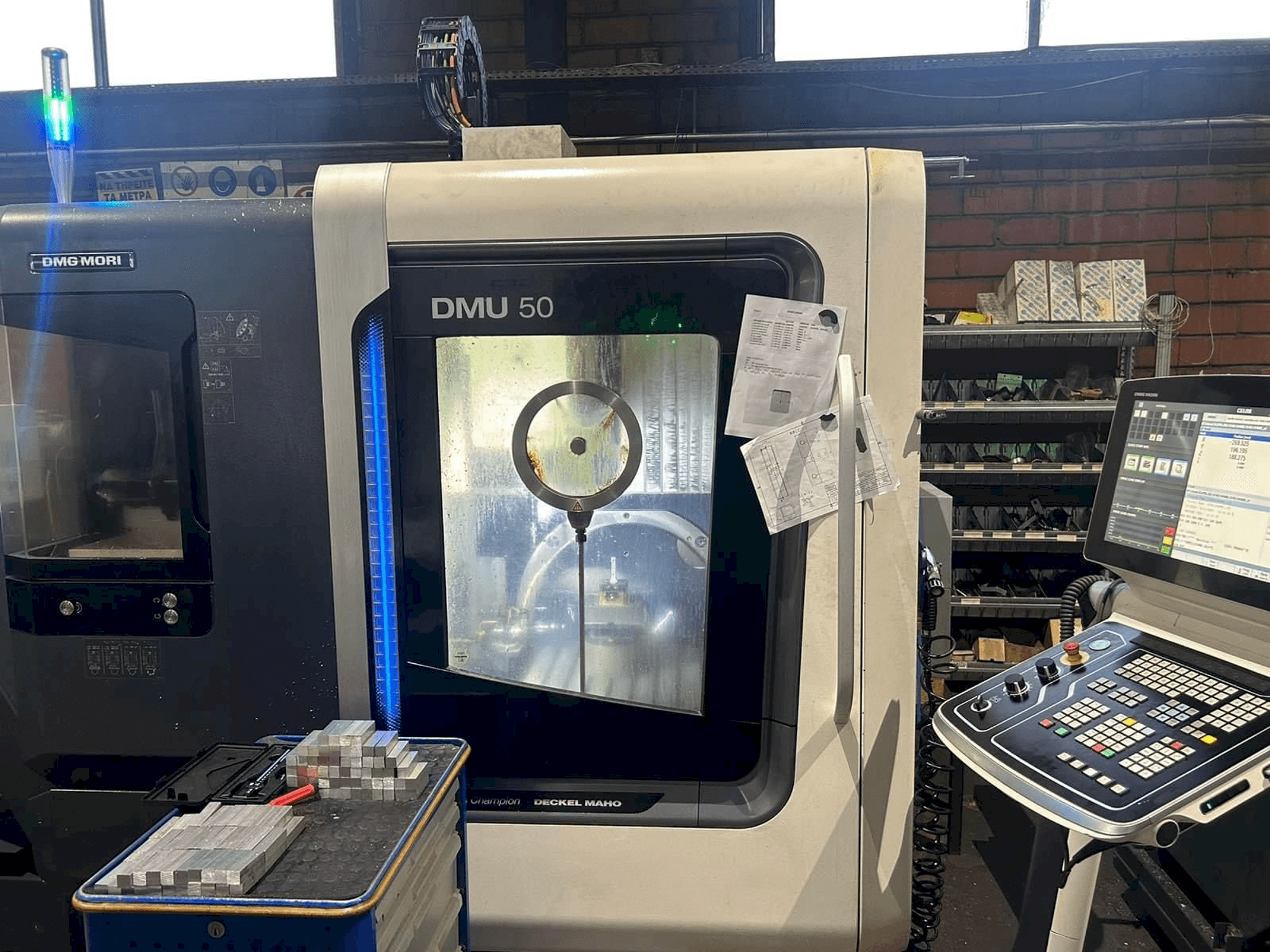Mašīnas DMG MORI DMU 50 pretskats