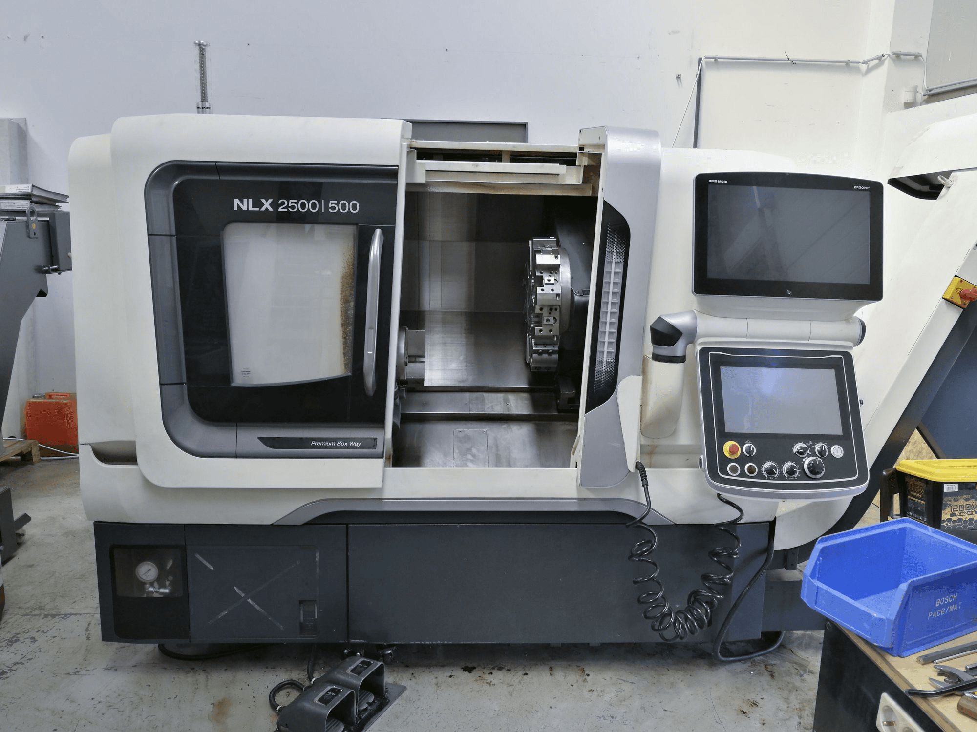 Mašīnas DMG MORI NLX 2500/500 pretskats