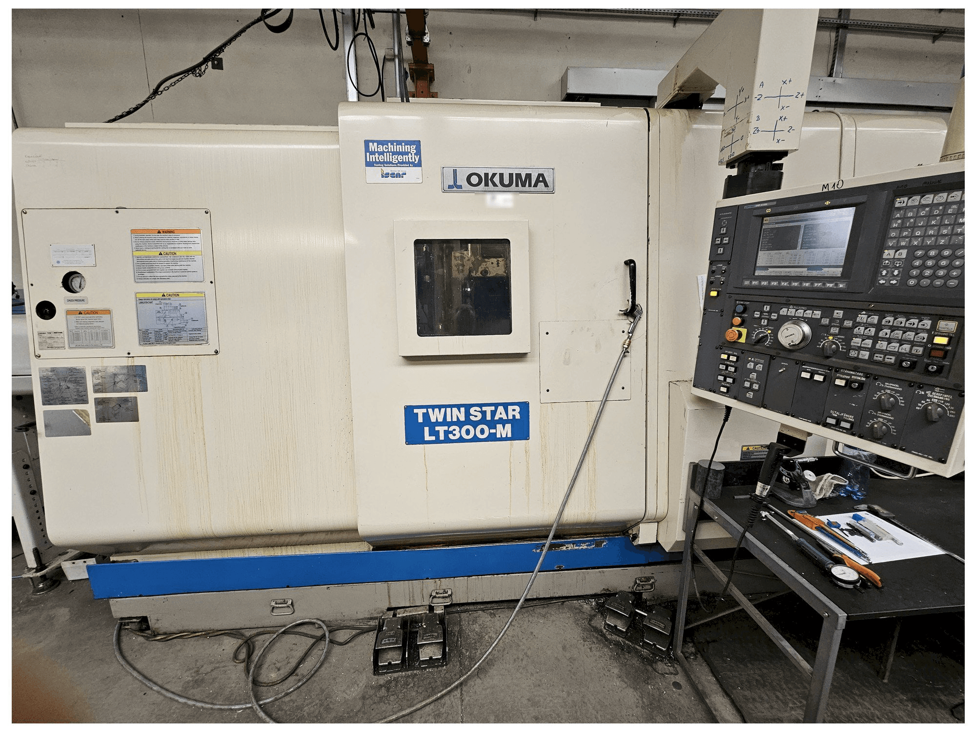 Mašīnas Okuma LT300-M pretskats
