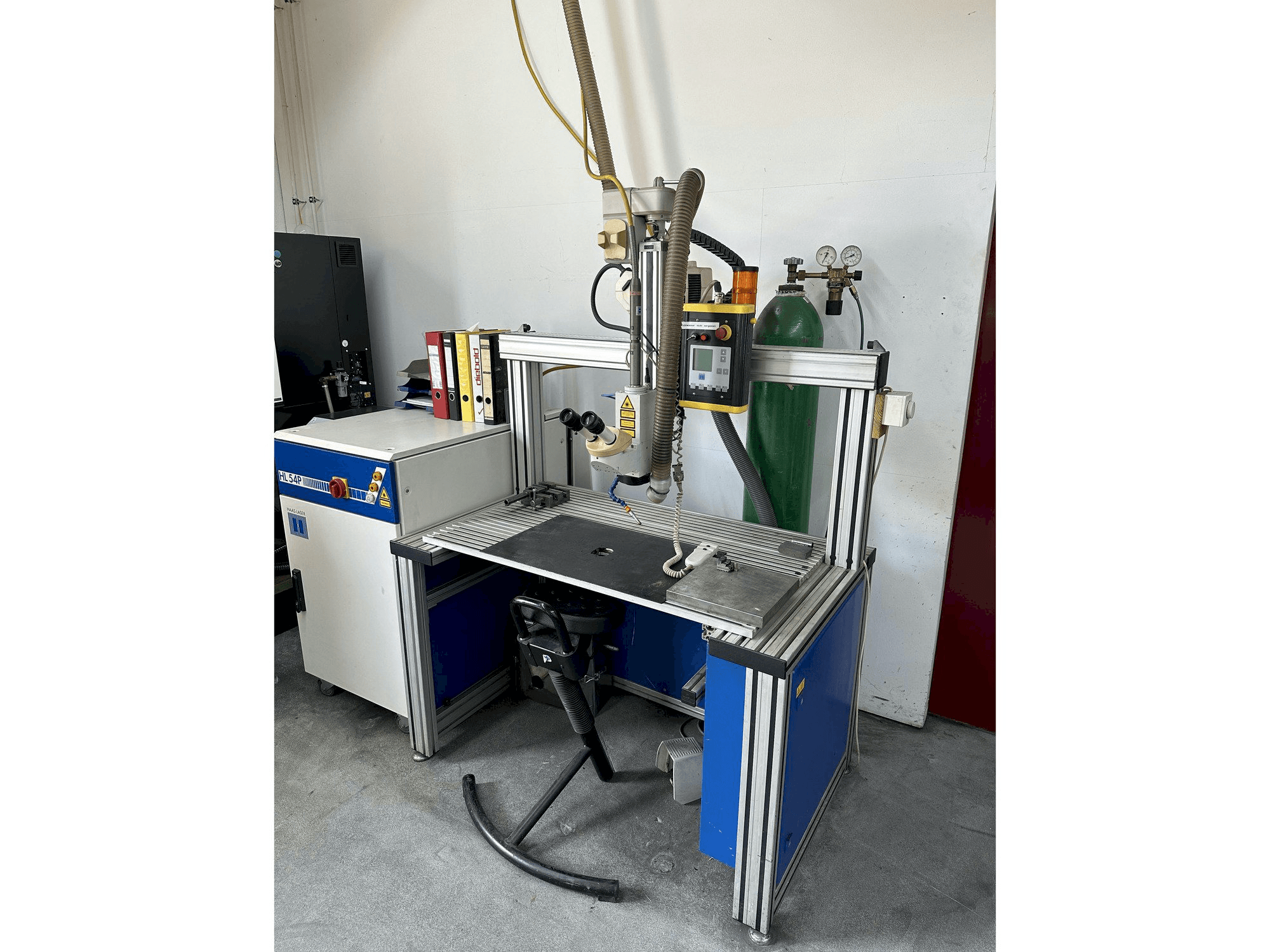 Mašīnas Haas-Laser HL 54P pretskats