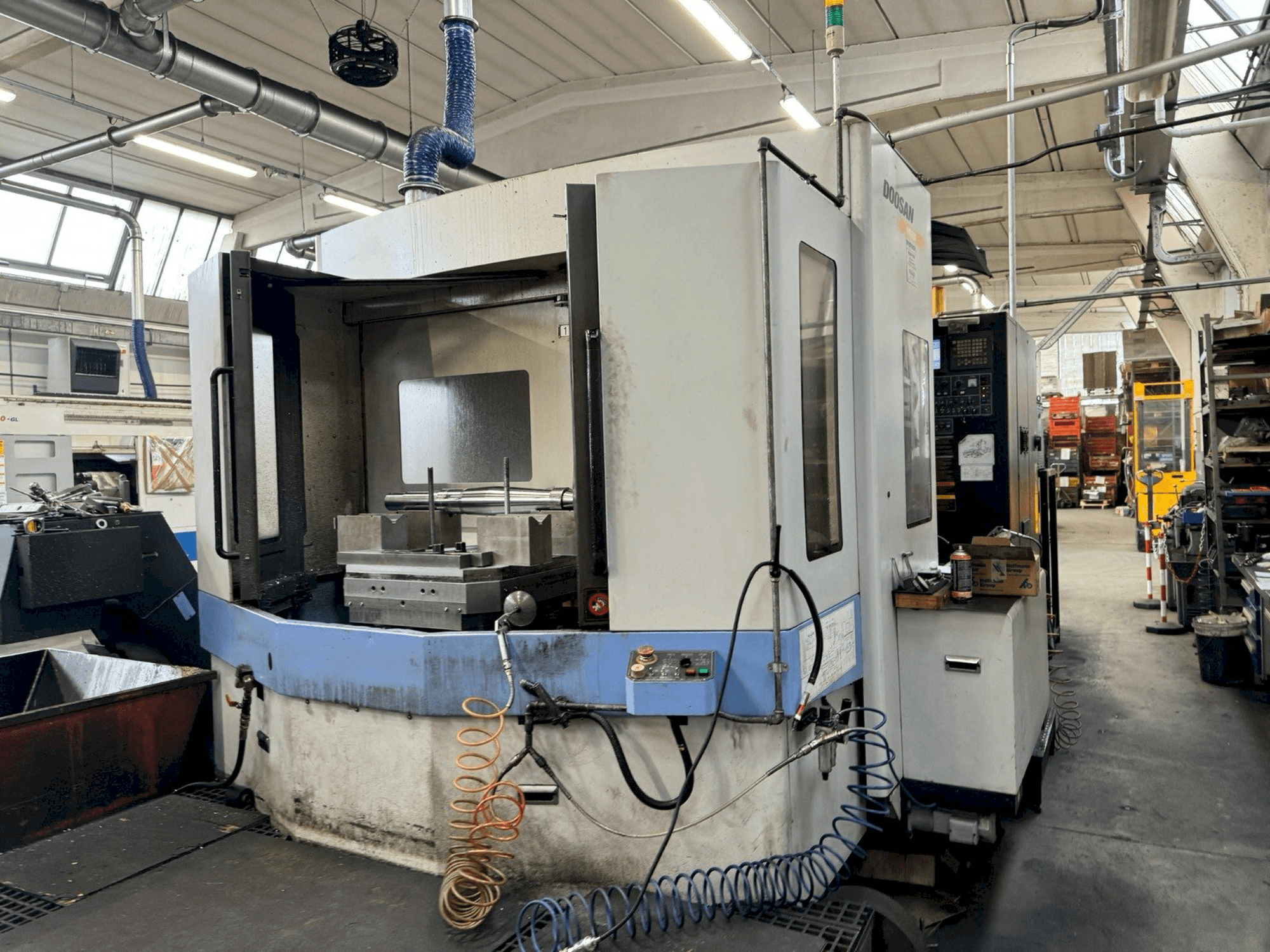 Mašīnas DOOSAN HM 630 pretskats