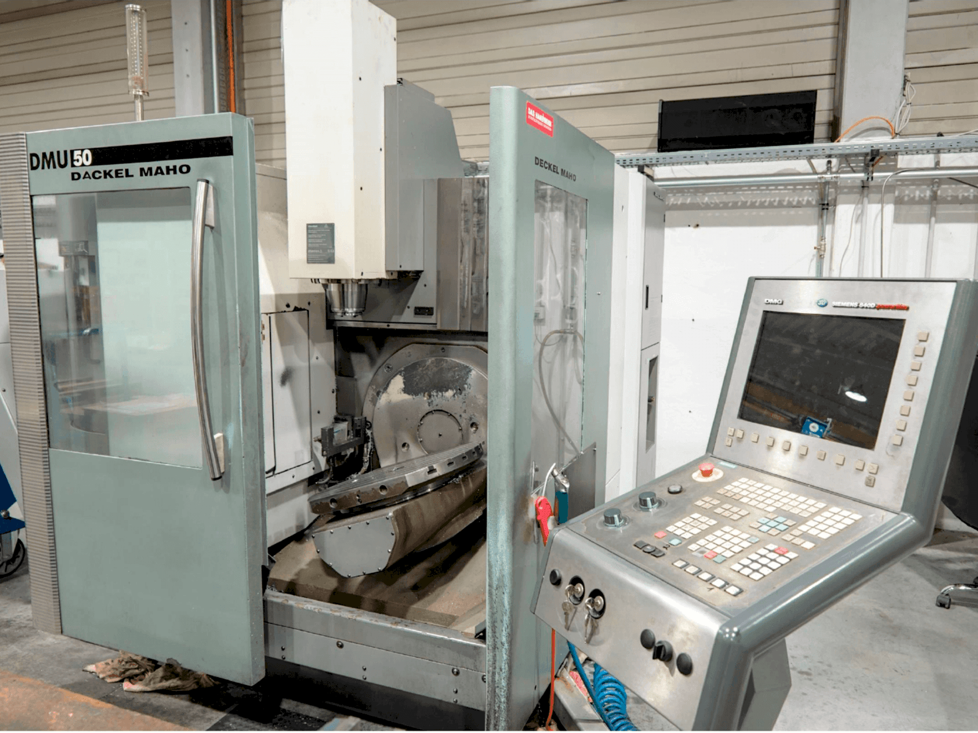 Mašīnas DMG DMU 50 pretskats