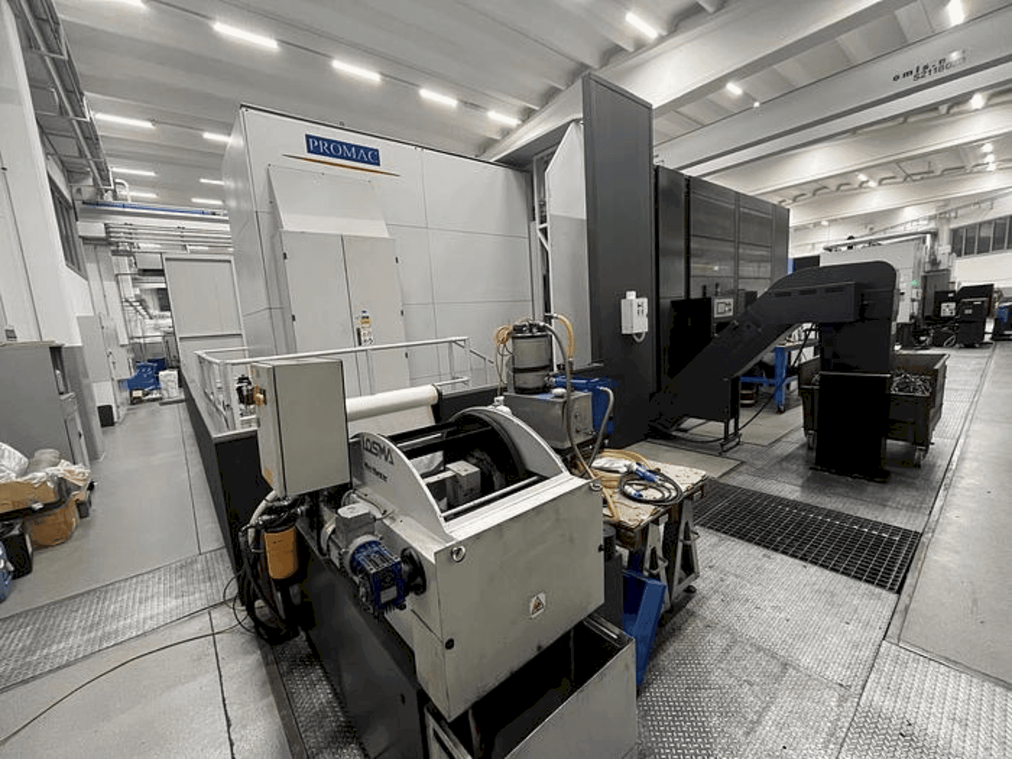 Mašīnas PROMAC ETESIAN HMC. A PORTALE pretskats