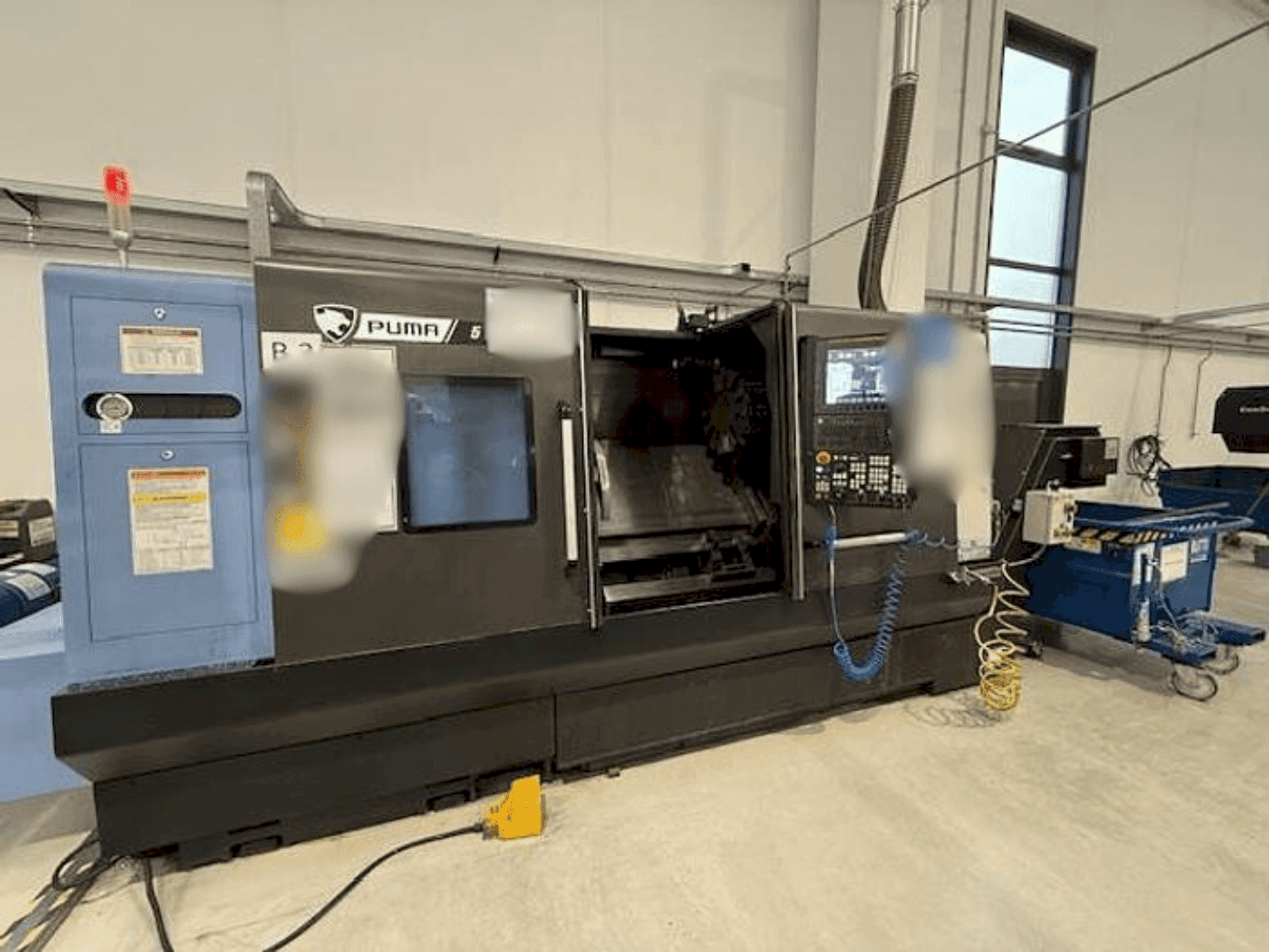 Mašīnas DOOSAN PUMA 5100A pretskats
