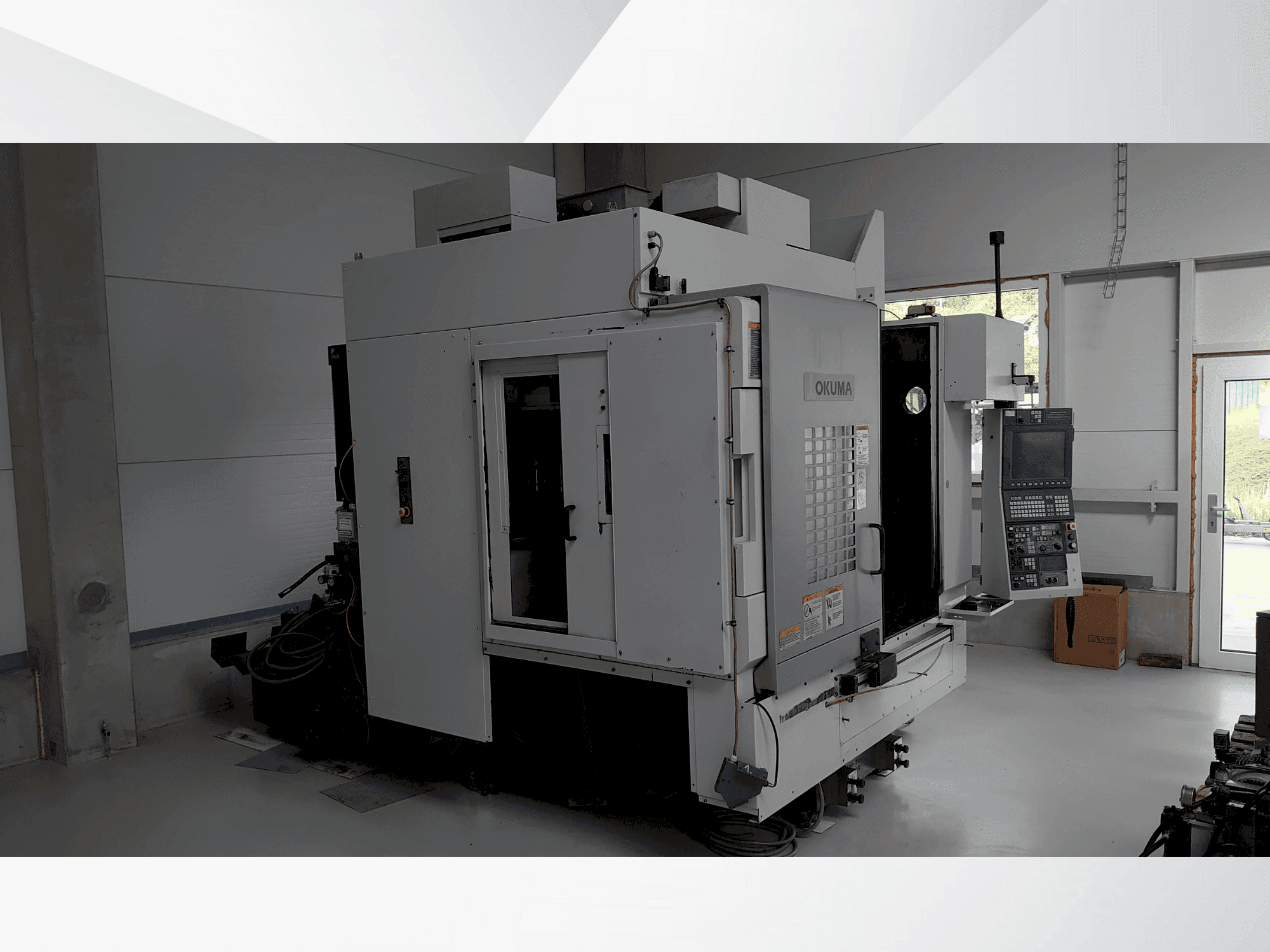 Mašīnas Okuma MU-400VA pretskats