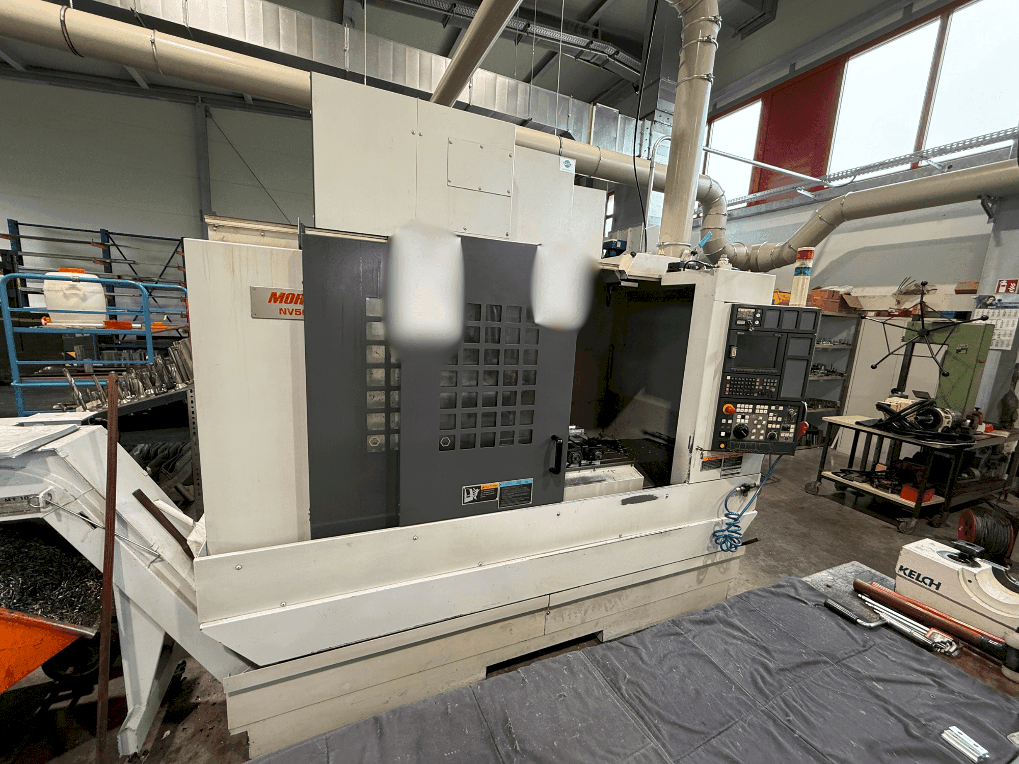 Mašīnas MORI SEIKI NV 5000 a1 B/40 pretskats