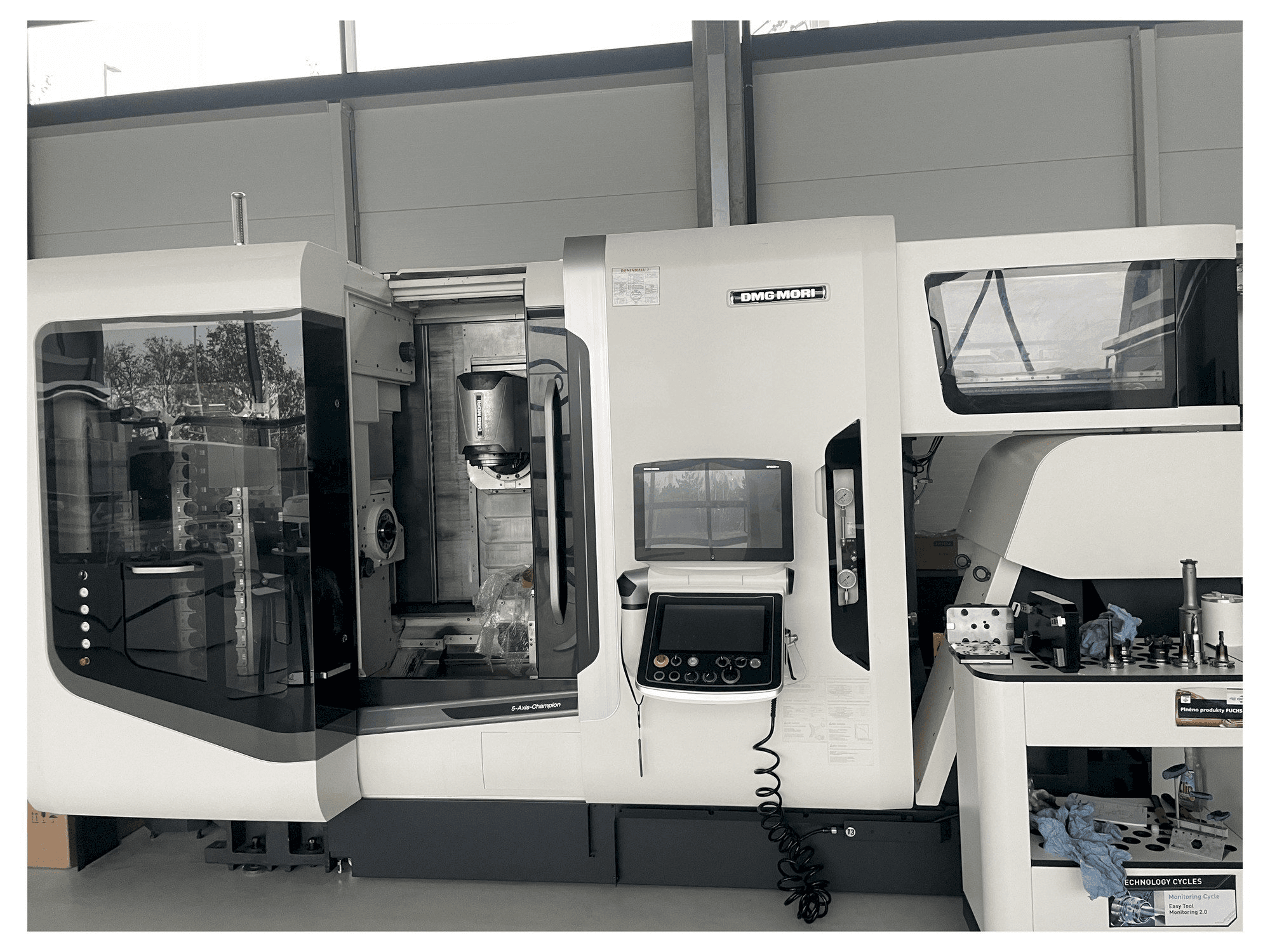 Mašīnas DMG MORI NTX 1000 pretskats