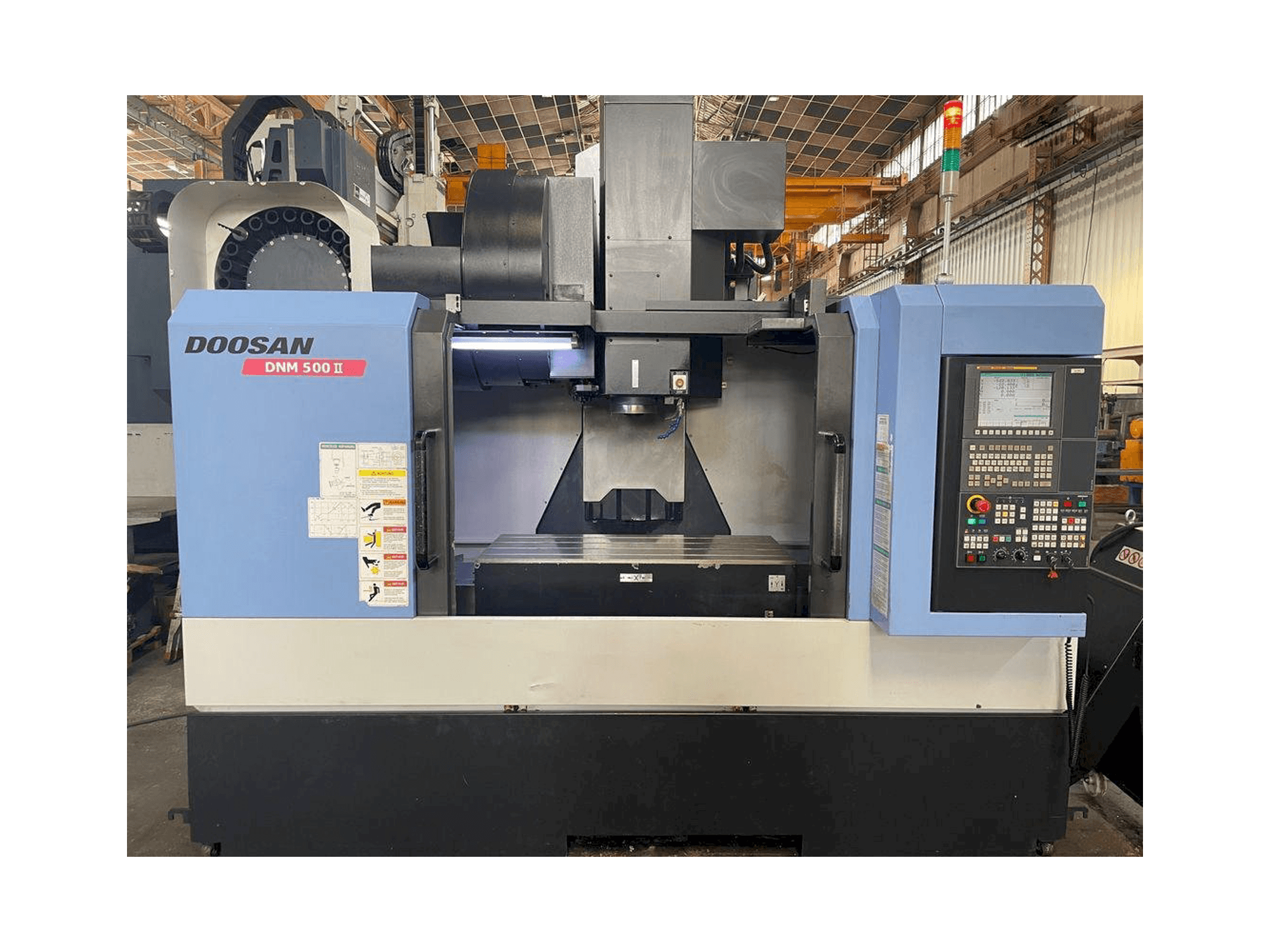 Mašīnas Doosan MYNX DNM 500 II pretskats